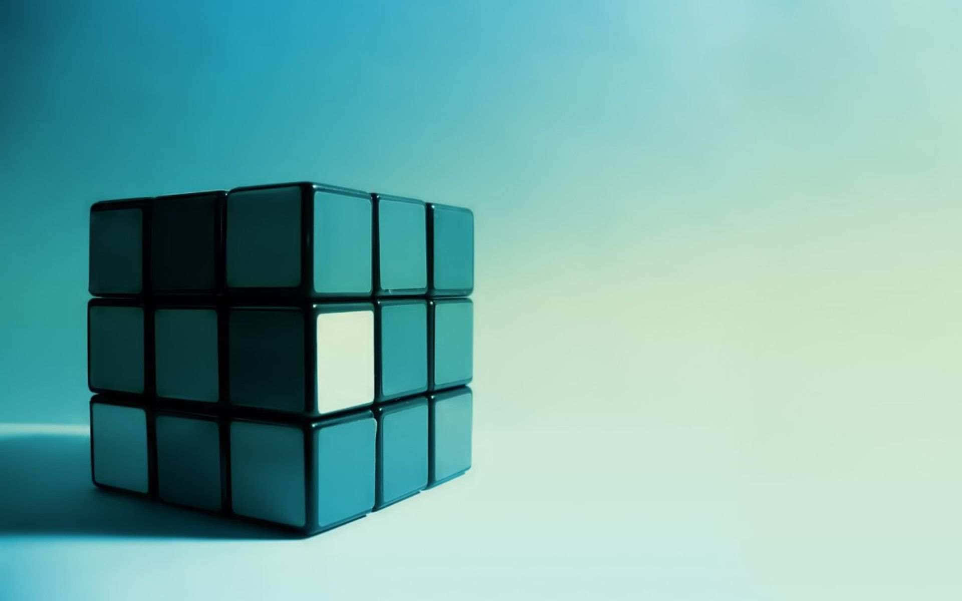 Solved Rubiks Cube Blue Backdrop Wallpaper