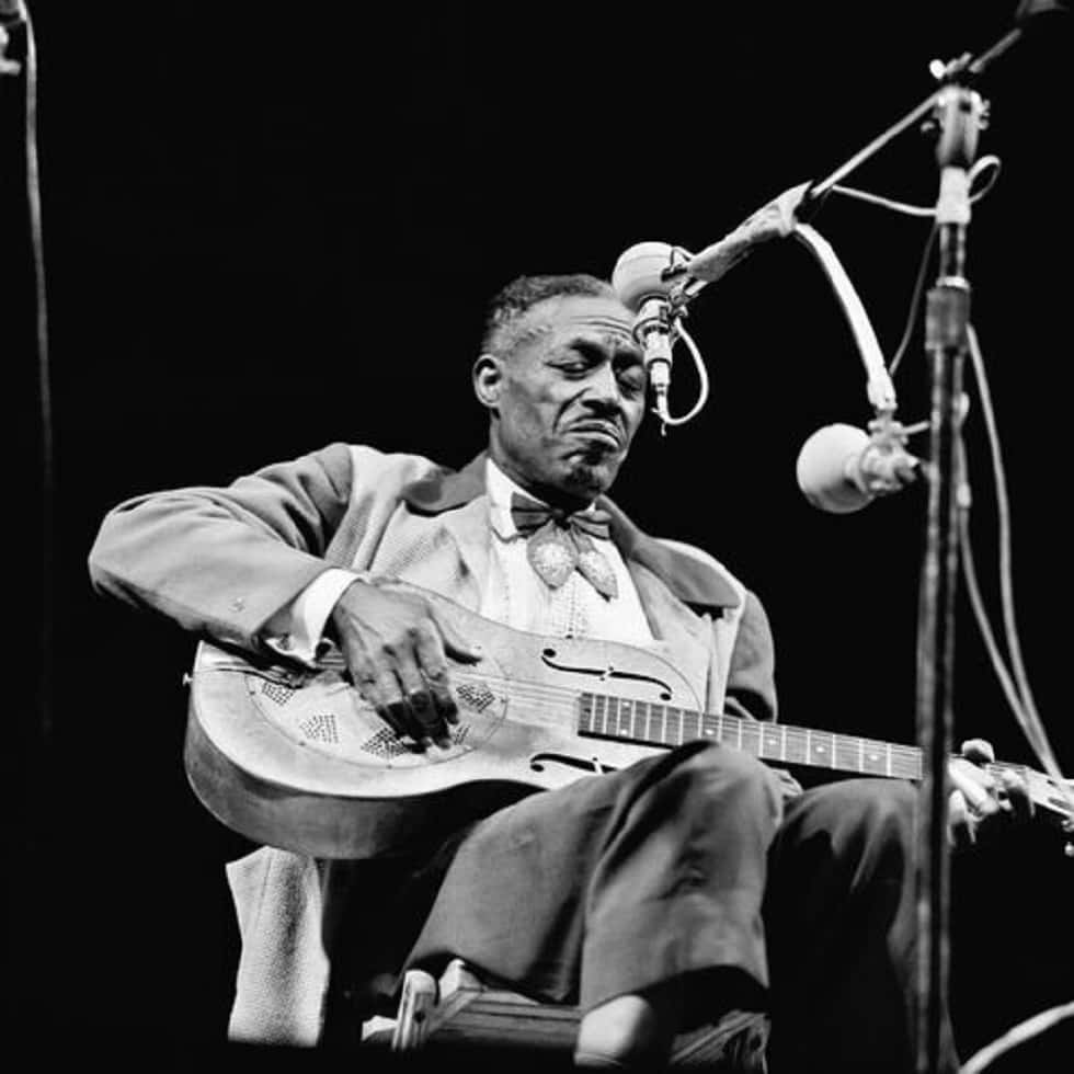 Son House Stage Performance Wallpaper