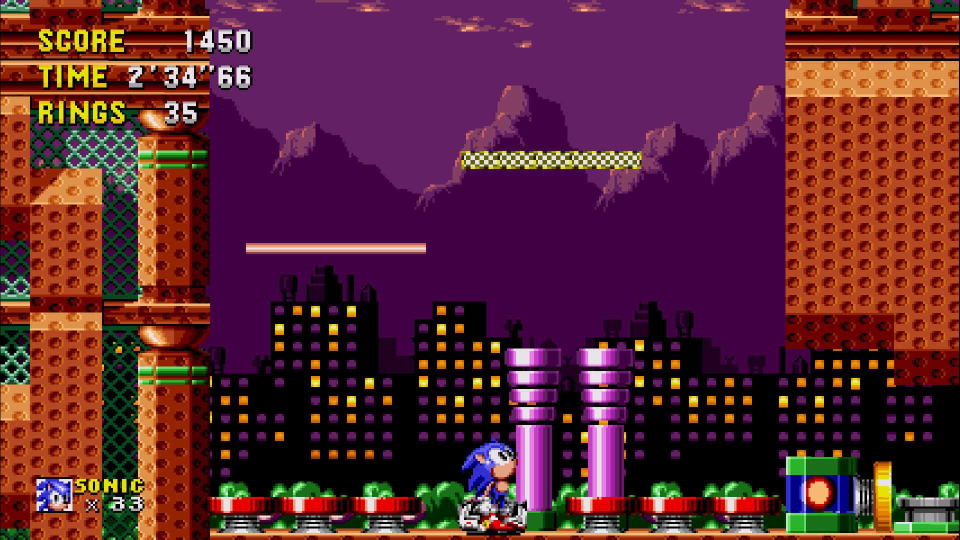 Sonic the Hedgehog exploring the vibrant Spring Yard Zone Wallpaper