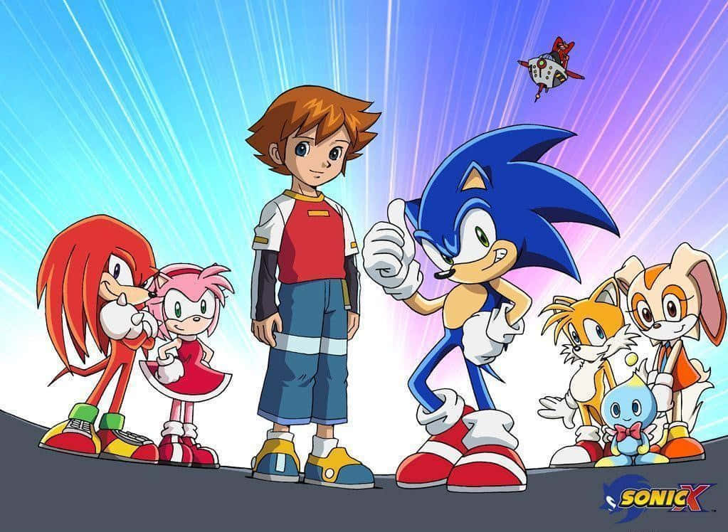 Sonic the Hedgehog and friends in action in the popular Sonic X anime series. Wallpaper