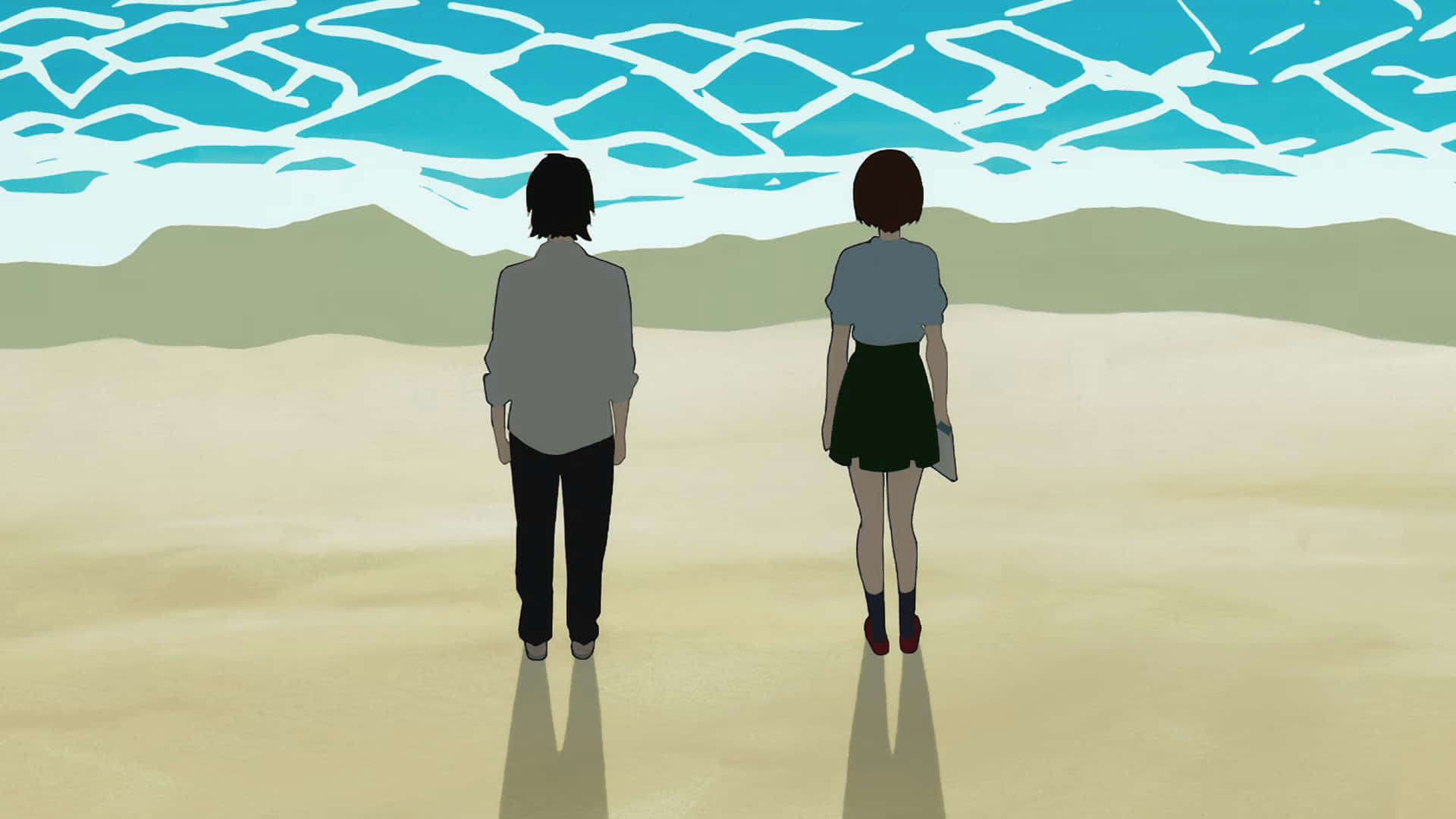 Two People Standing On The Beach
