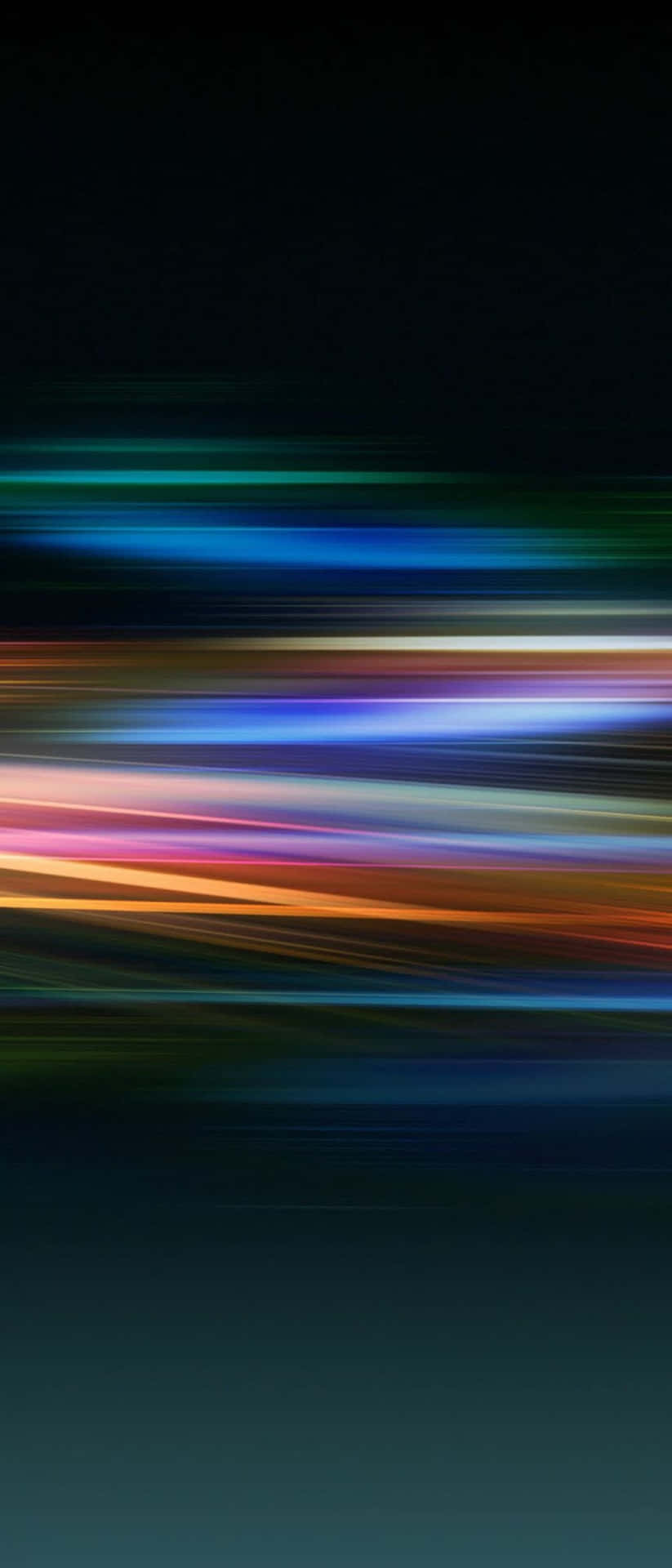 A Colorful Abstract Image Of A Light Streak Wallpaper