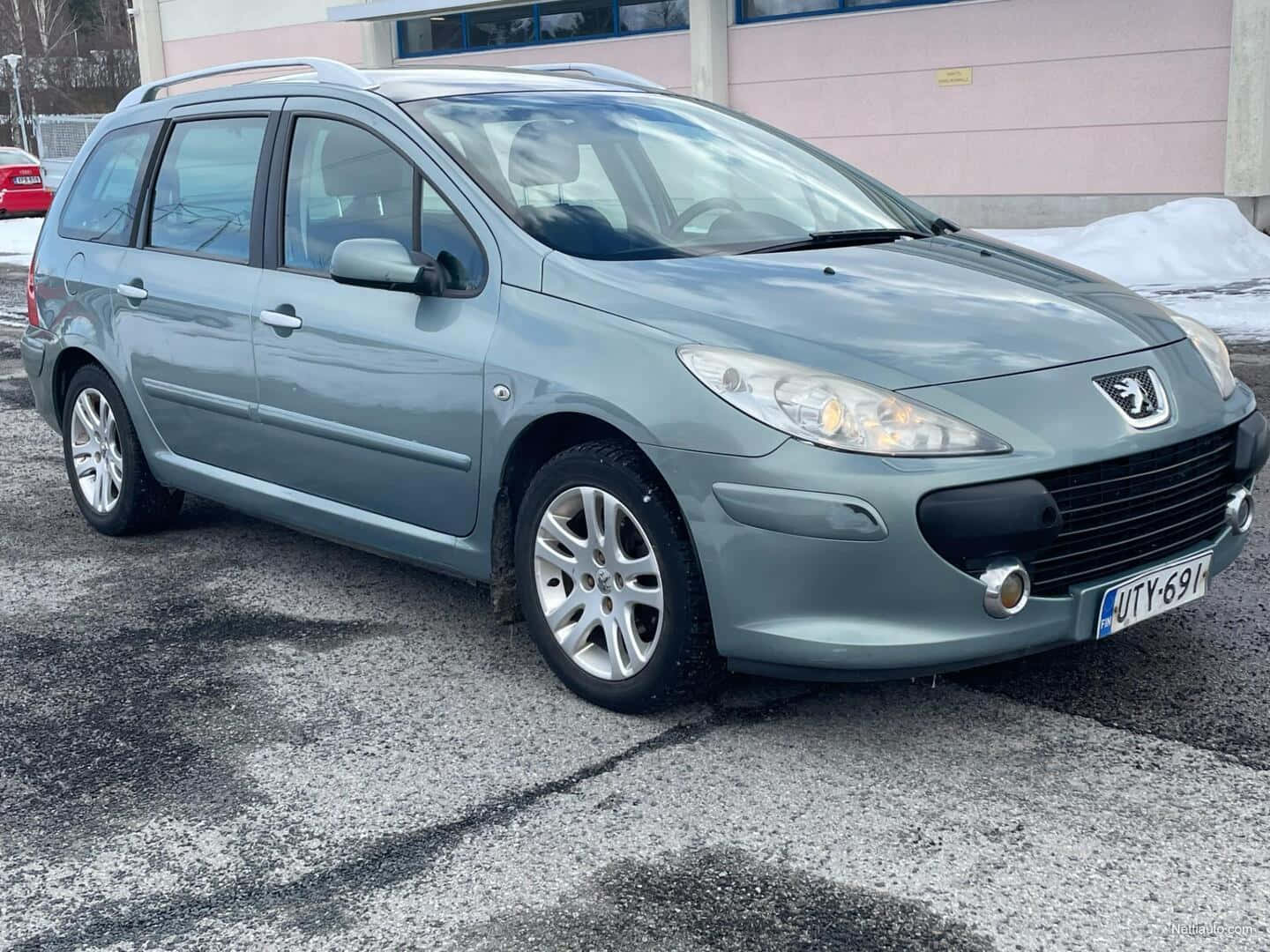 Sophisticated Peugeot 307 In Red - Unveiling A Symbol Of Luxury Wallpaper