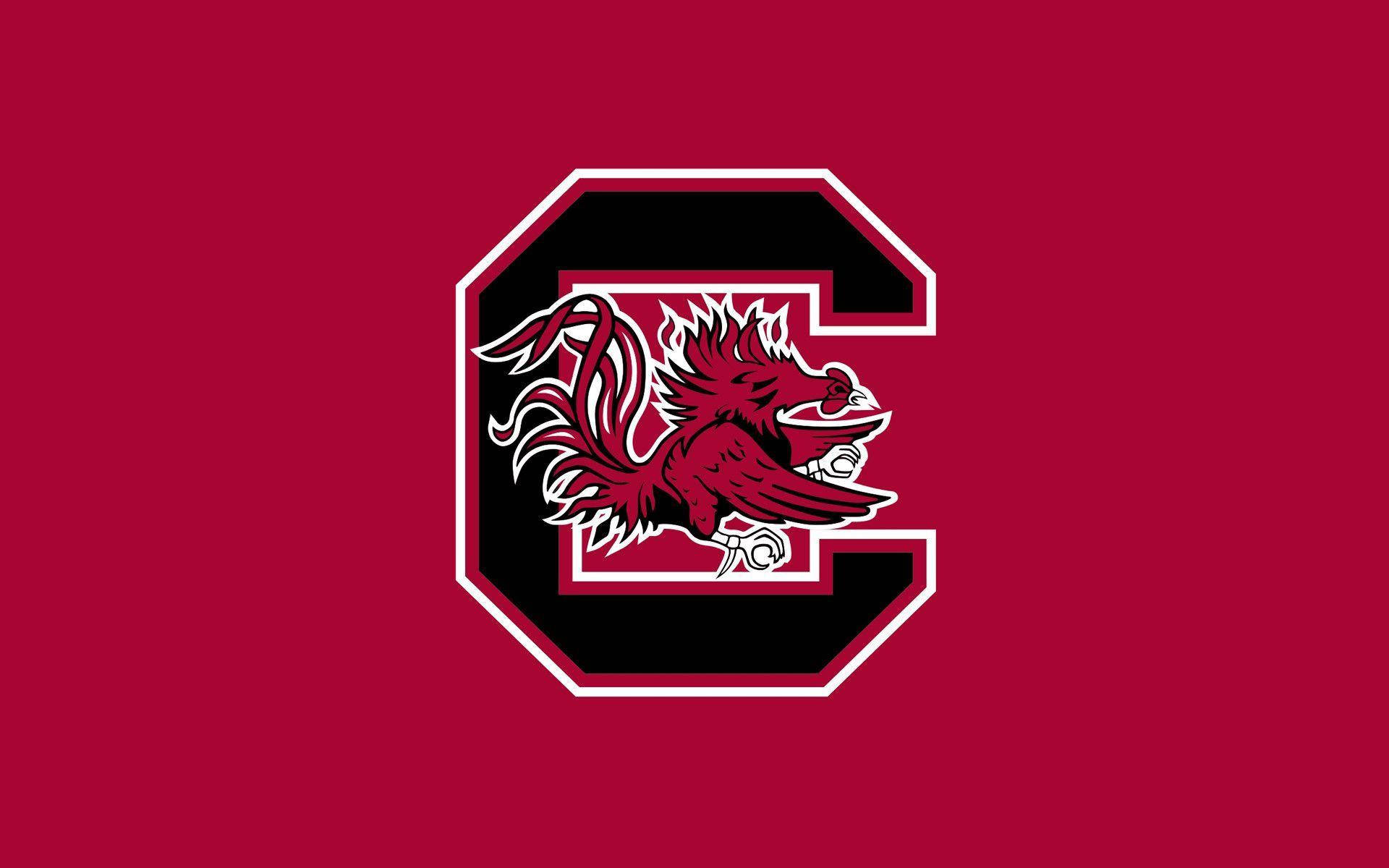 South Carolina Gamecocks Logo On Red Wallpaper