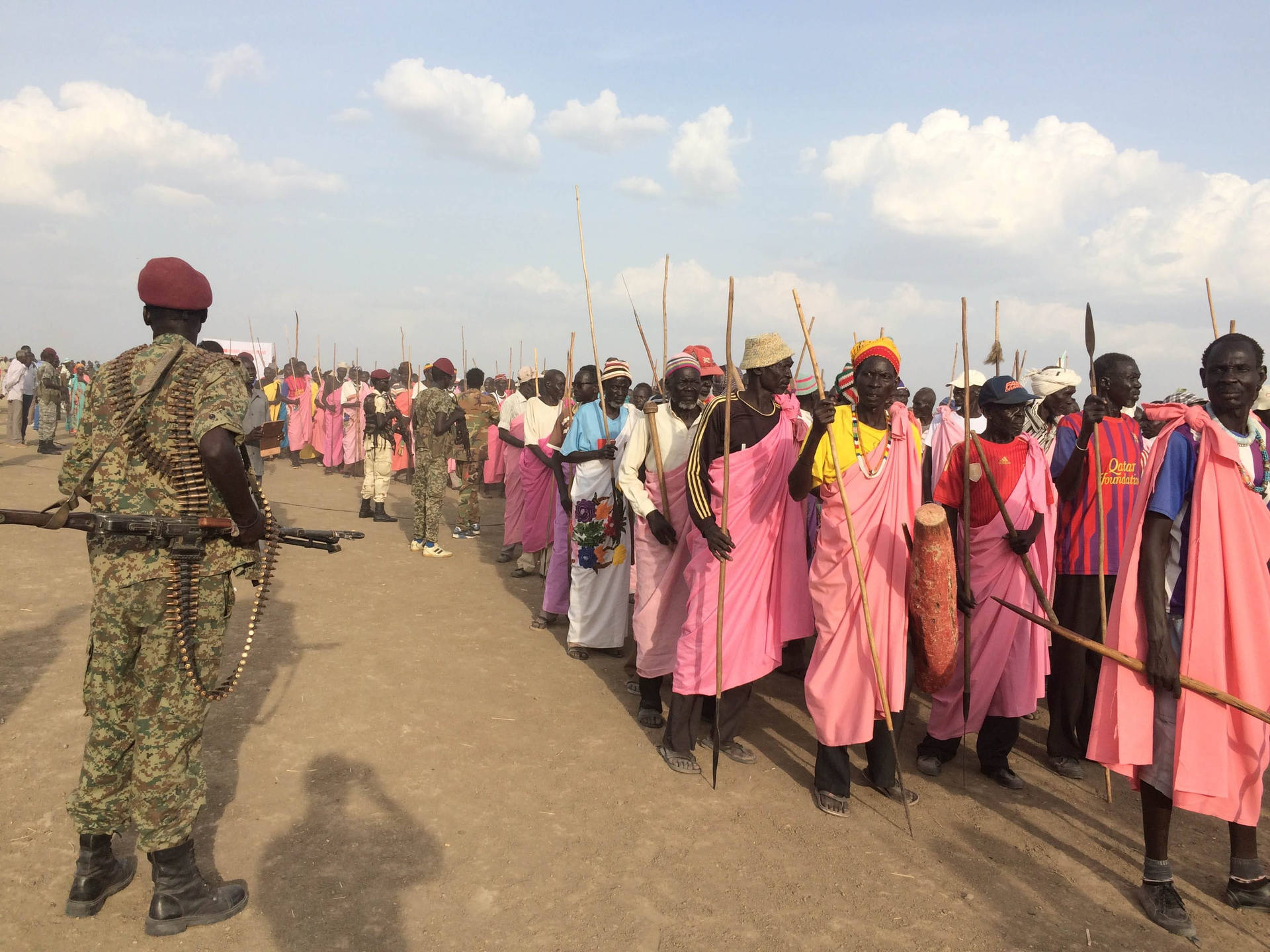 South Sudan Soldier in Vibrant Pink Clothing Wallpaper