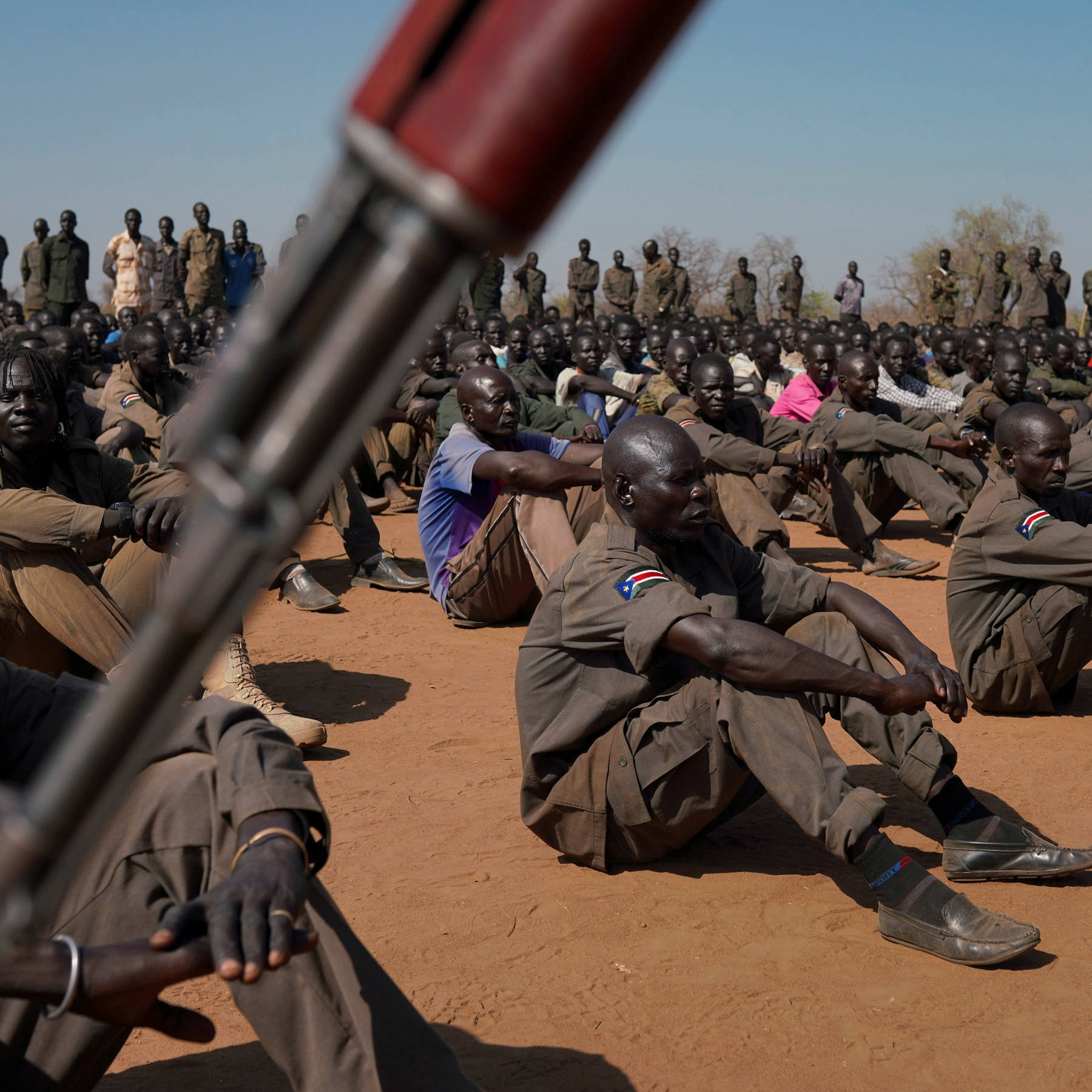South Sudan Soldiers Sitting Ground Wallpaper
