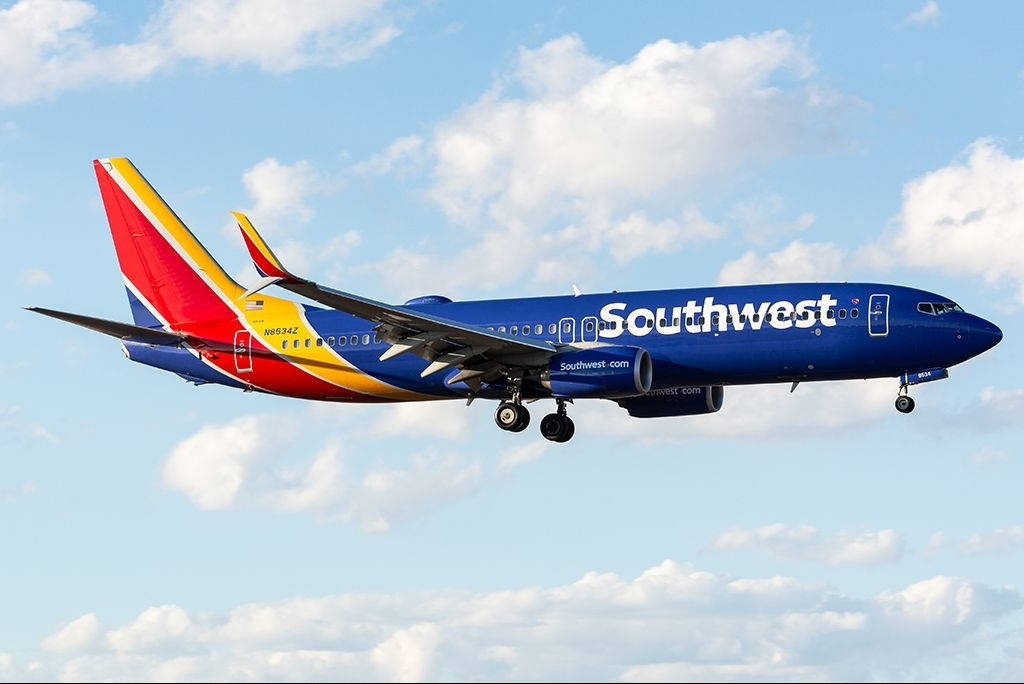Vueloen Avión De Southwest Airlines Fondo de pantalla