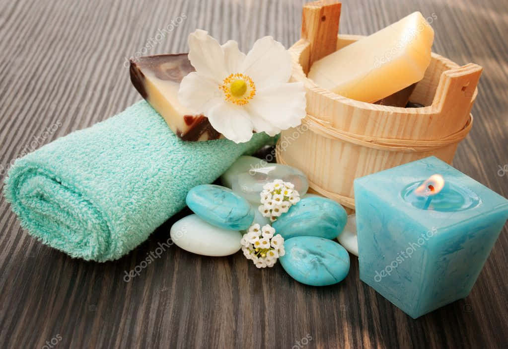 Spa Accessories With Blue Towels And Flowers On Wooden Table Stock Photo 6687199 Wallpaper