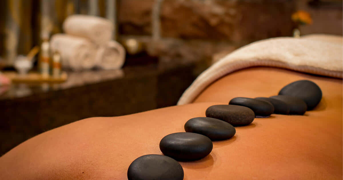 Woman With Spa Stones Pictures