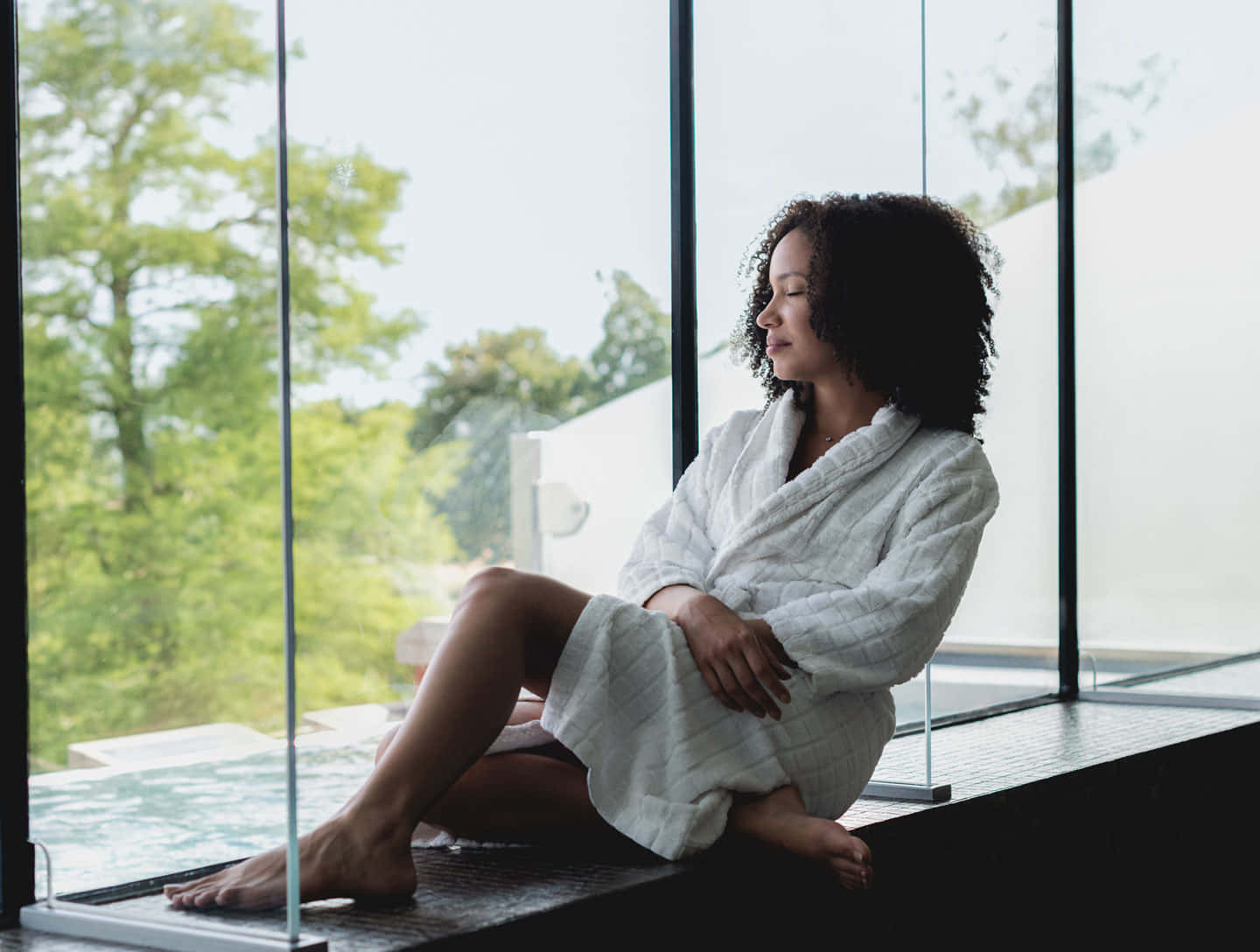 Woman Sitting In Spa Room Window Picture