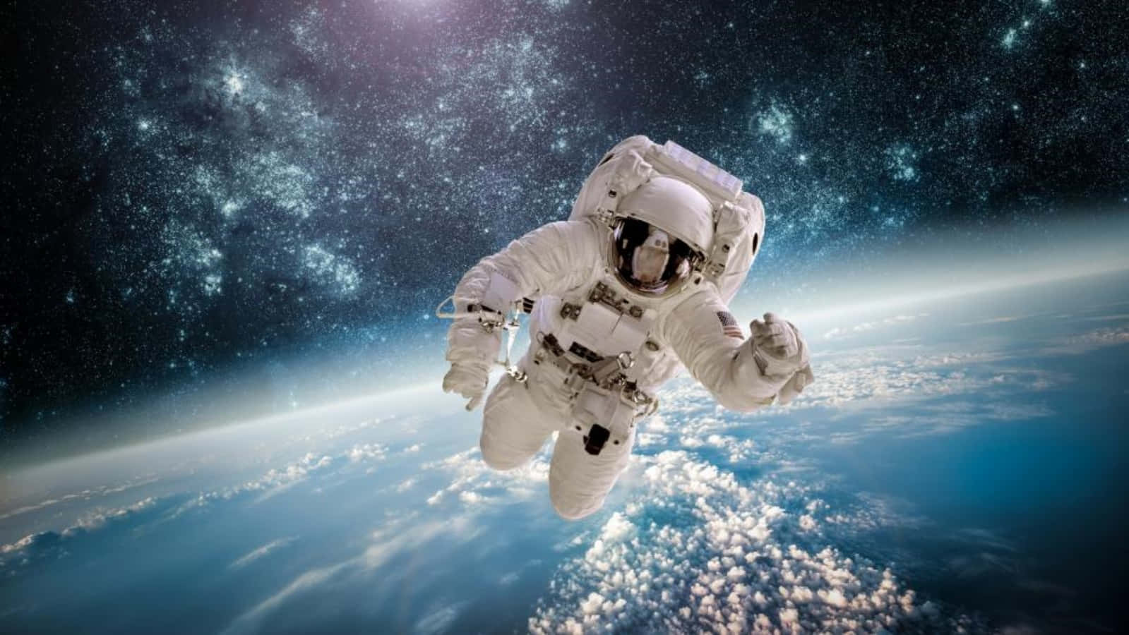 Astronaut Exploring the Cosmos Wallpaper