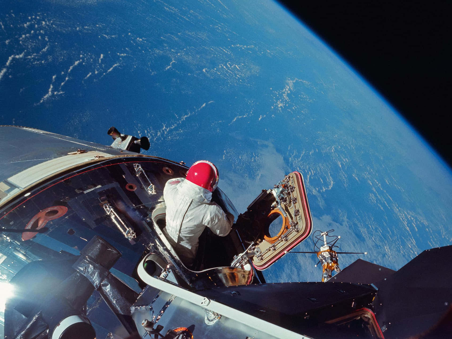 Astronaut venturing into the breathtaking cosmic expanse Wallpaper