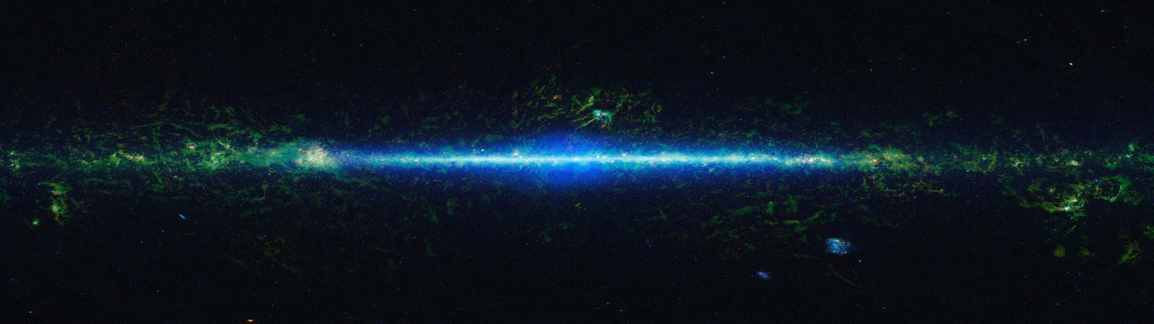 A Blue And Green Galaxy In Space Wallpaper