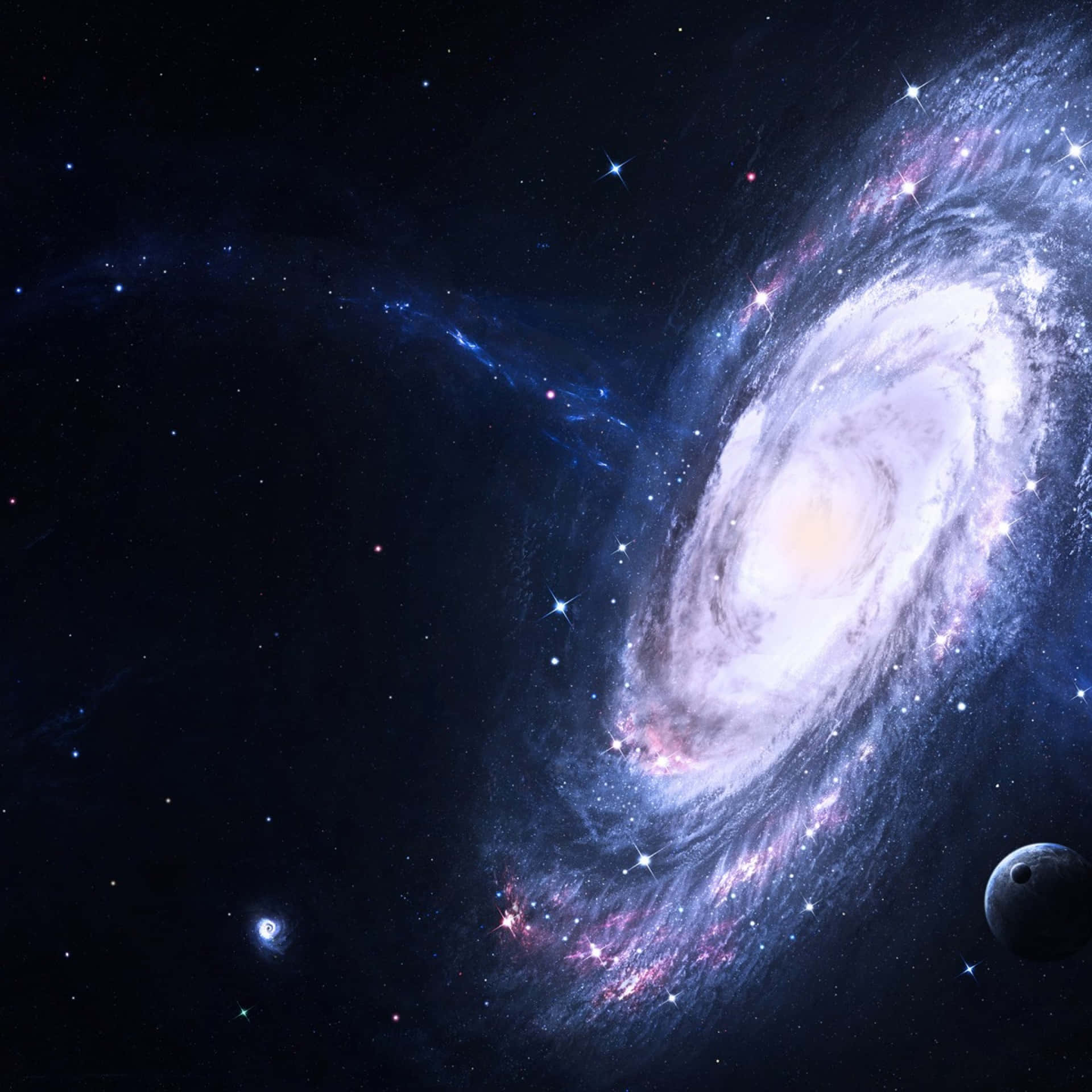 Et galakse med en spiral galakse på baggrunden. Wallpaper