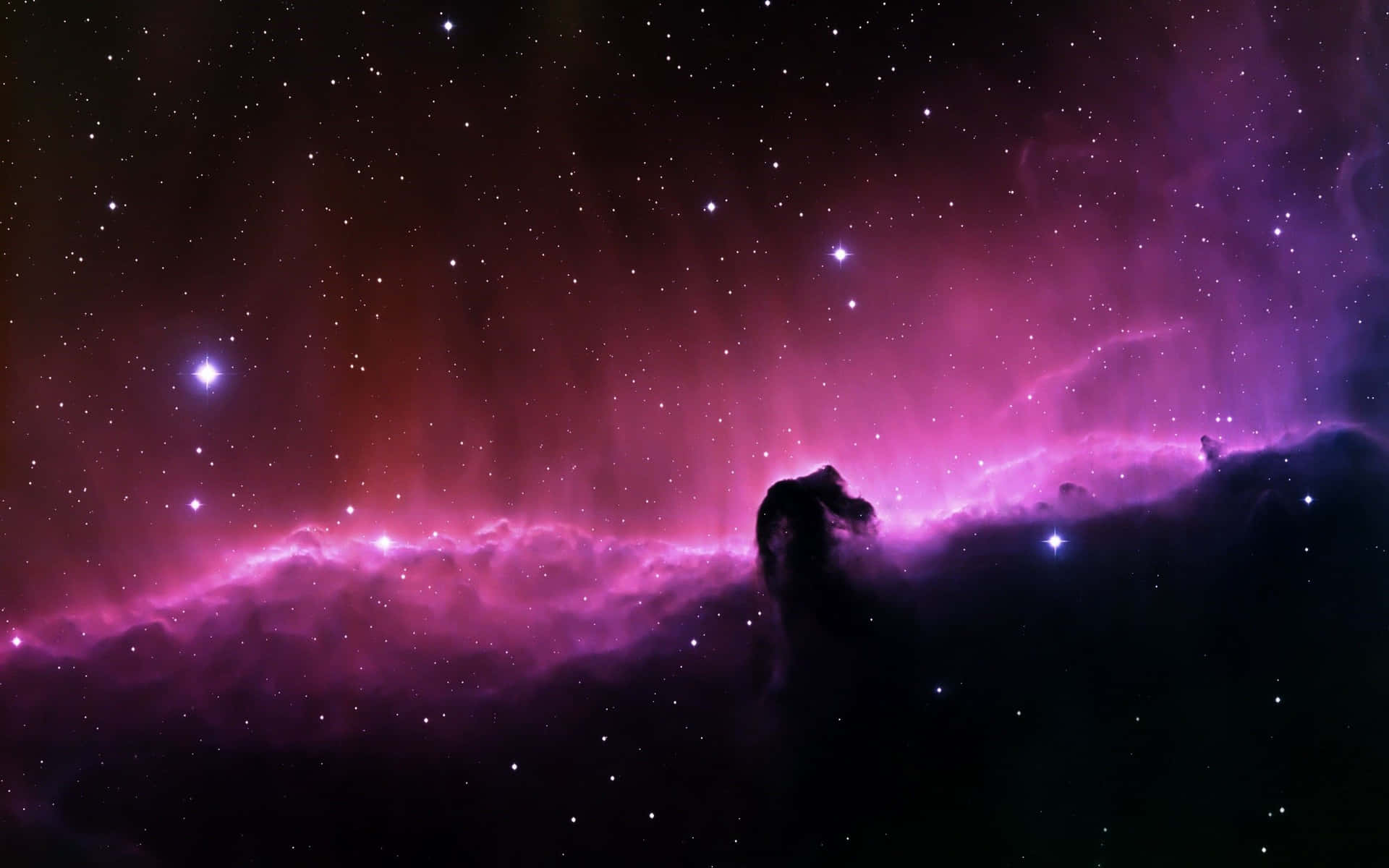 "A Captivating look into the depths of Space Nebula" Wallpaper