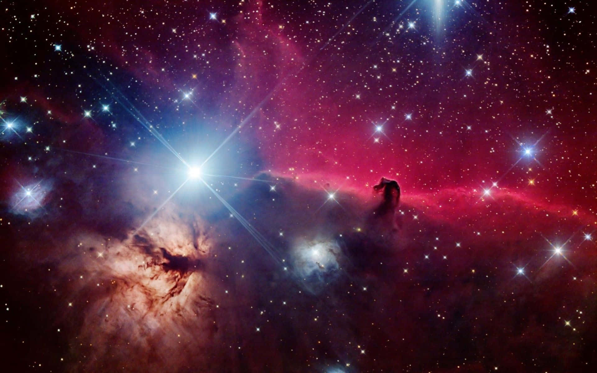 An awe-inspiring view of a cosmic nebula in deep space Wallpaper