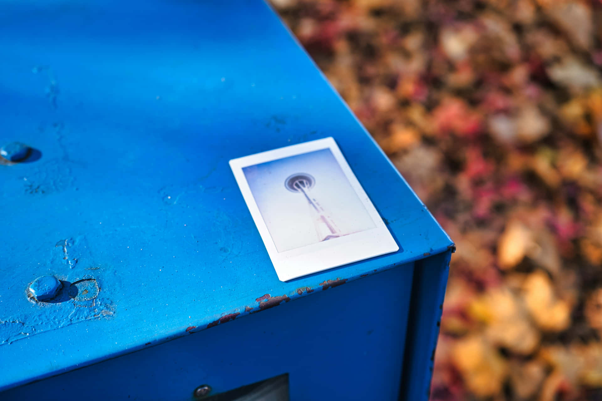 Space Needle Polaroidon Blue Surface Wallpaper