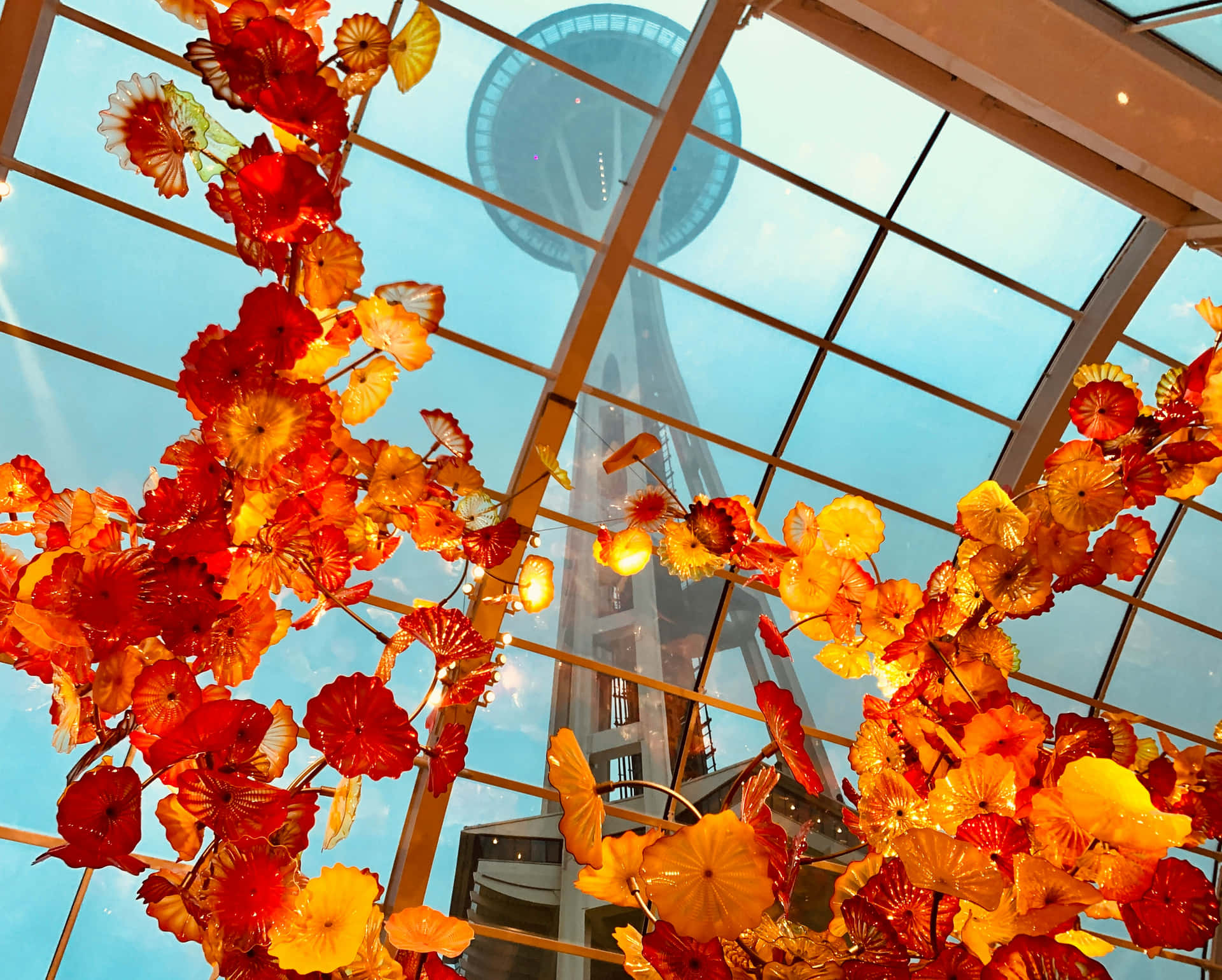 Space Needle Through Glass Ceilingwith Floral Display Wallpaper