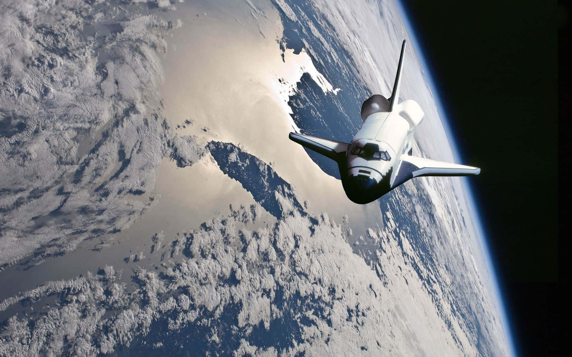 Transbordadorespacial En La Atmósfera De La Tierra Fondo de pantalla