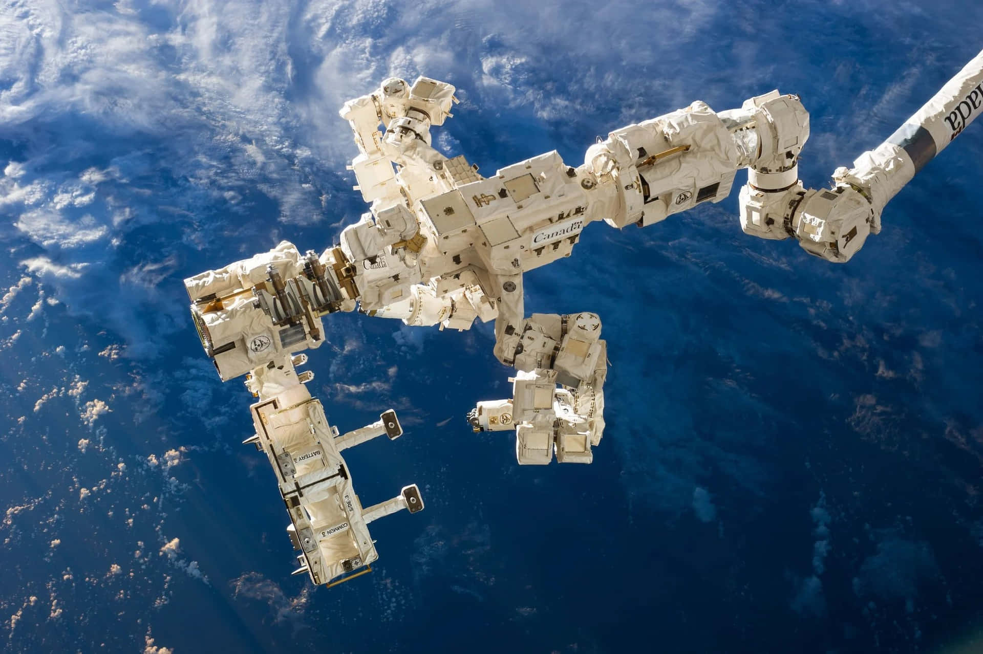 Stunning view of a space station orbiting Earth. Wallpaper