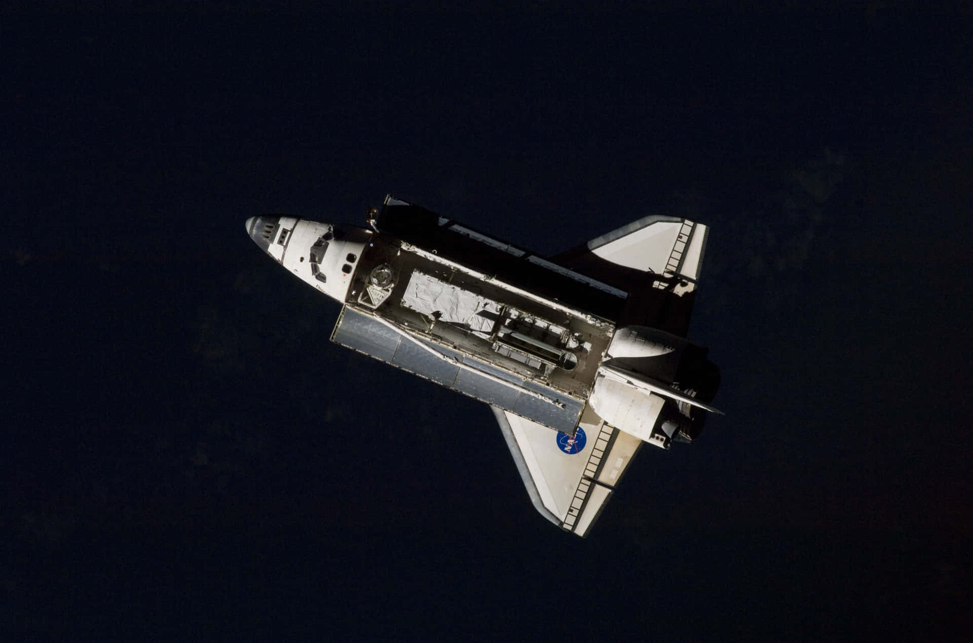 Naveespacial Futurista Surcando El Espacio. Fondo de pantalla