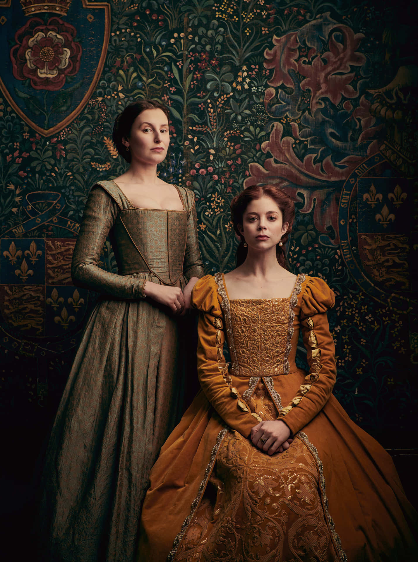 Two Women In Renaissance Dresses Posing For A Photo Wallpaper