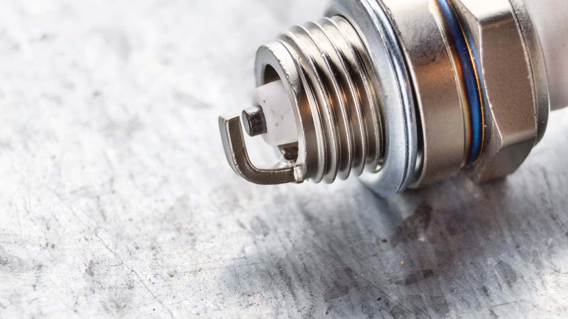 Spark Plug Placed On Surface Wallpaper