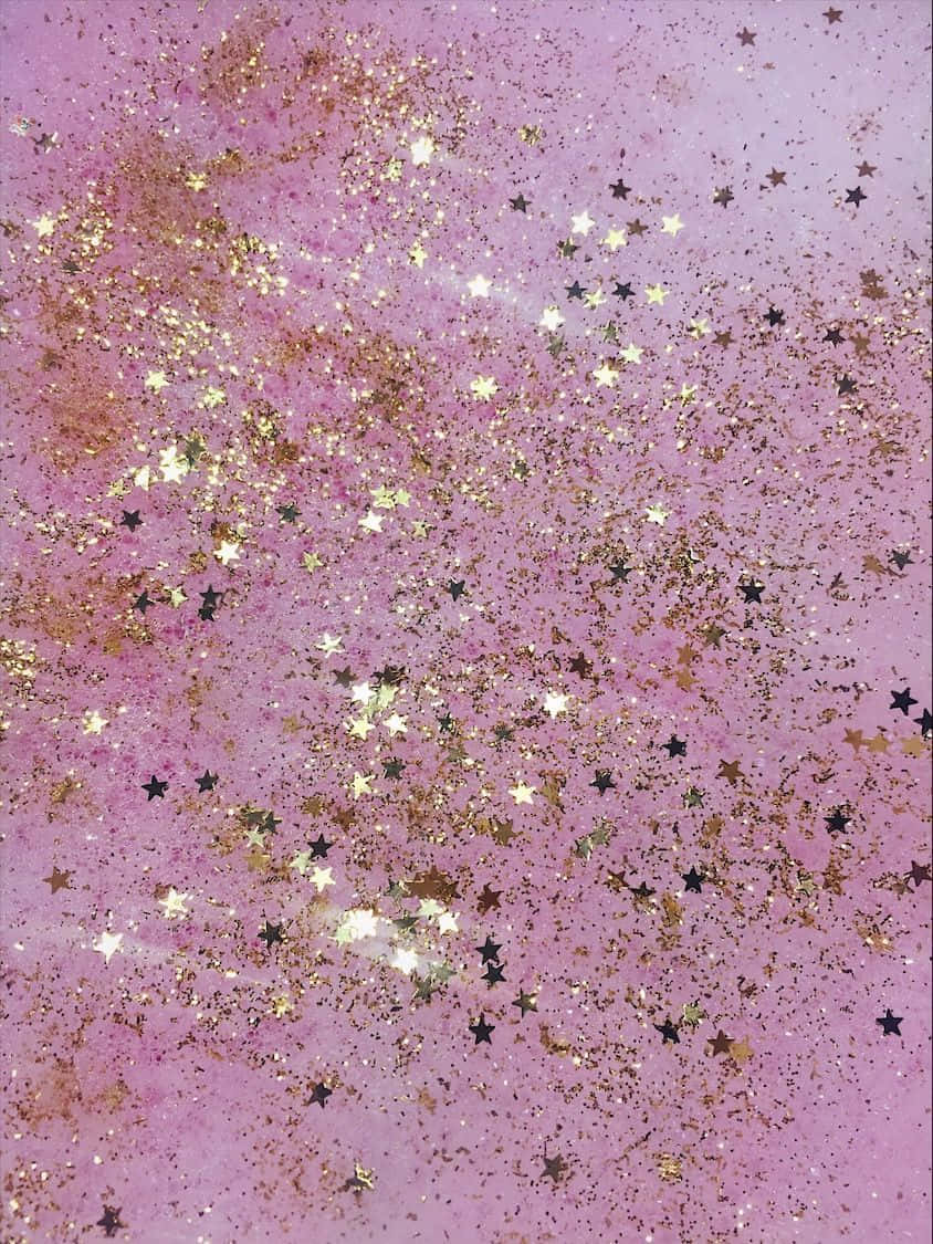 A Pink And Gold Glittery Painting With Stars Wallpaper