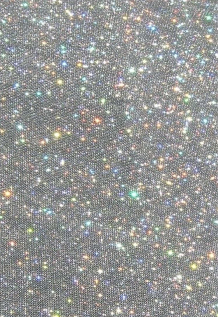 Einenahaufnahme Eines Schwarzen Stoffes Mit Mehrfarbigen Sternen Wallpaper