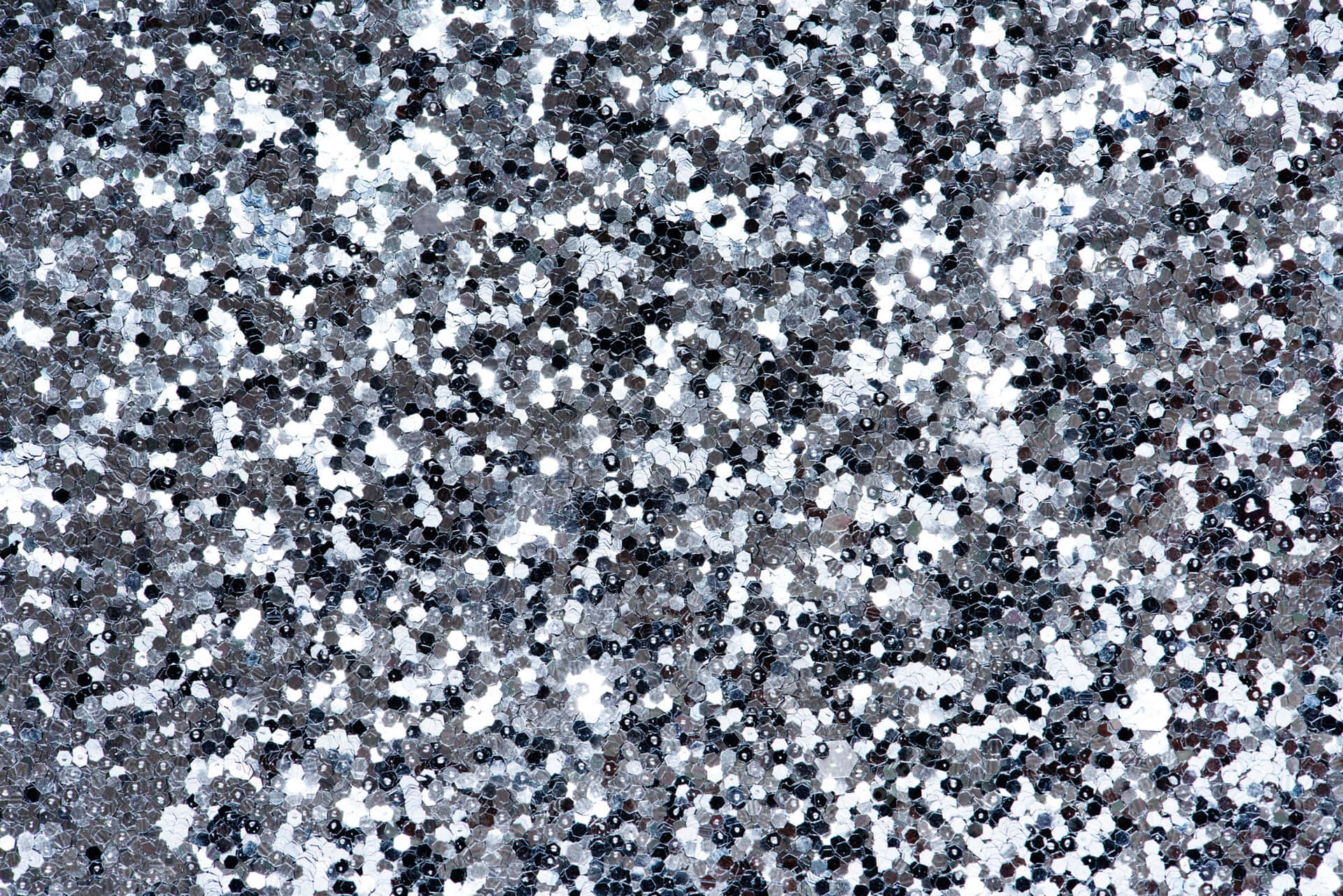 En sort og hvid baggrund med masser af små hvide prikker