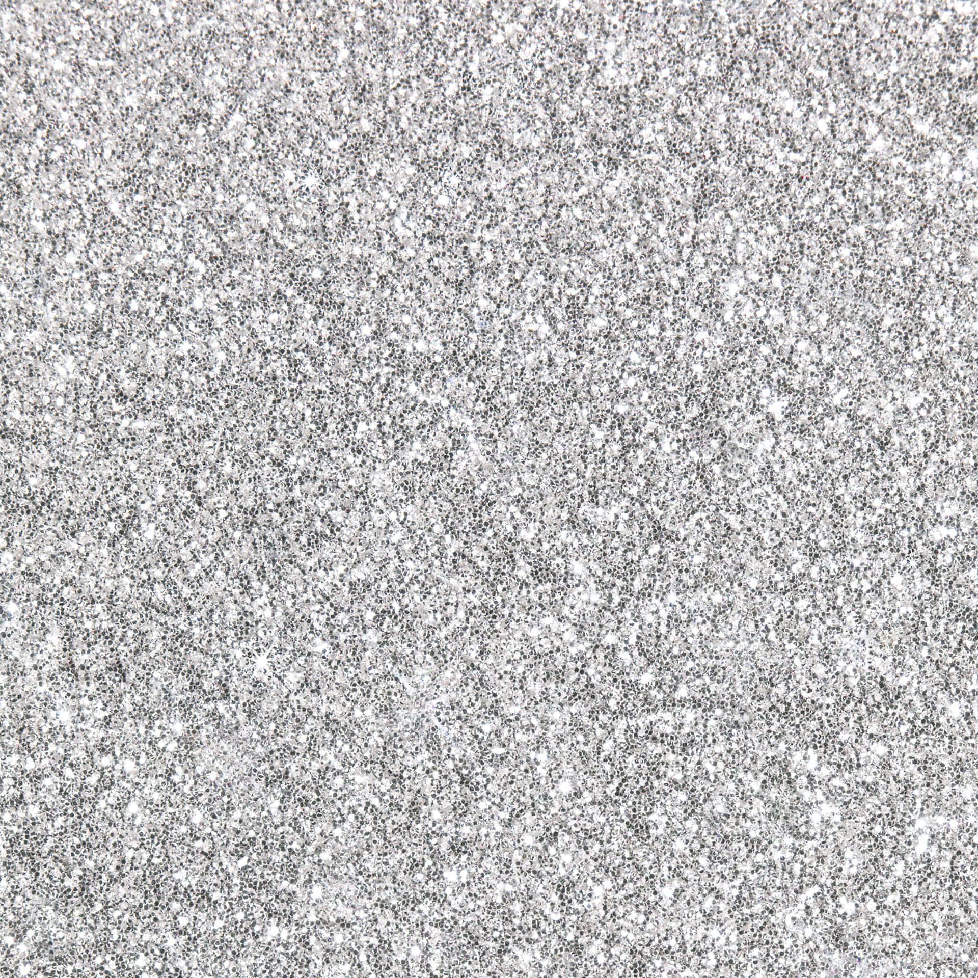 A Close Up Of A Silver Glitter Background