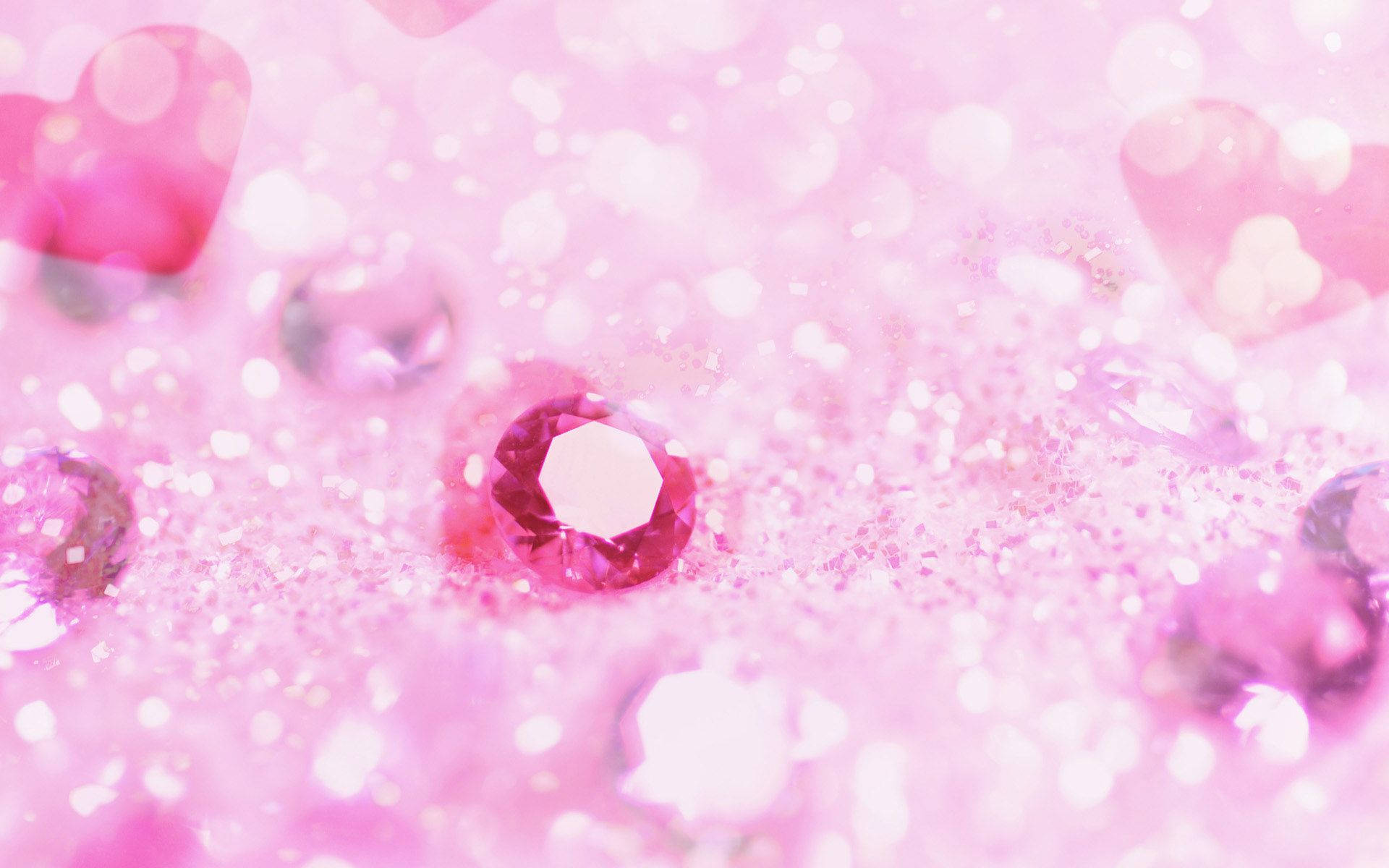 Beauty Unfolds in the Shine of Sparkling Pink Diamonds and Gems Wallpaper