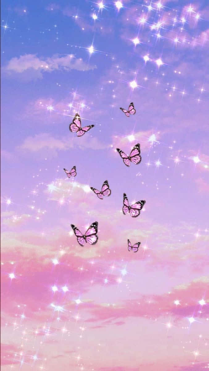 Sparkling Pink Sky With Butterflies Wallpaper