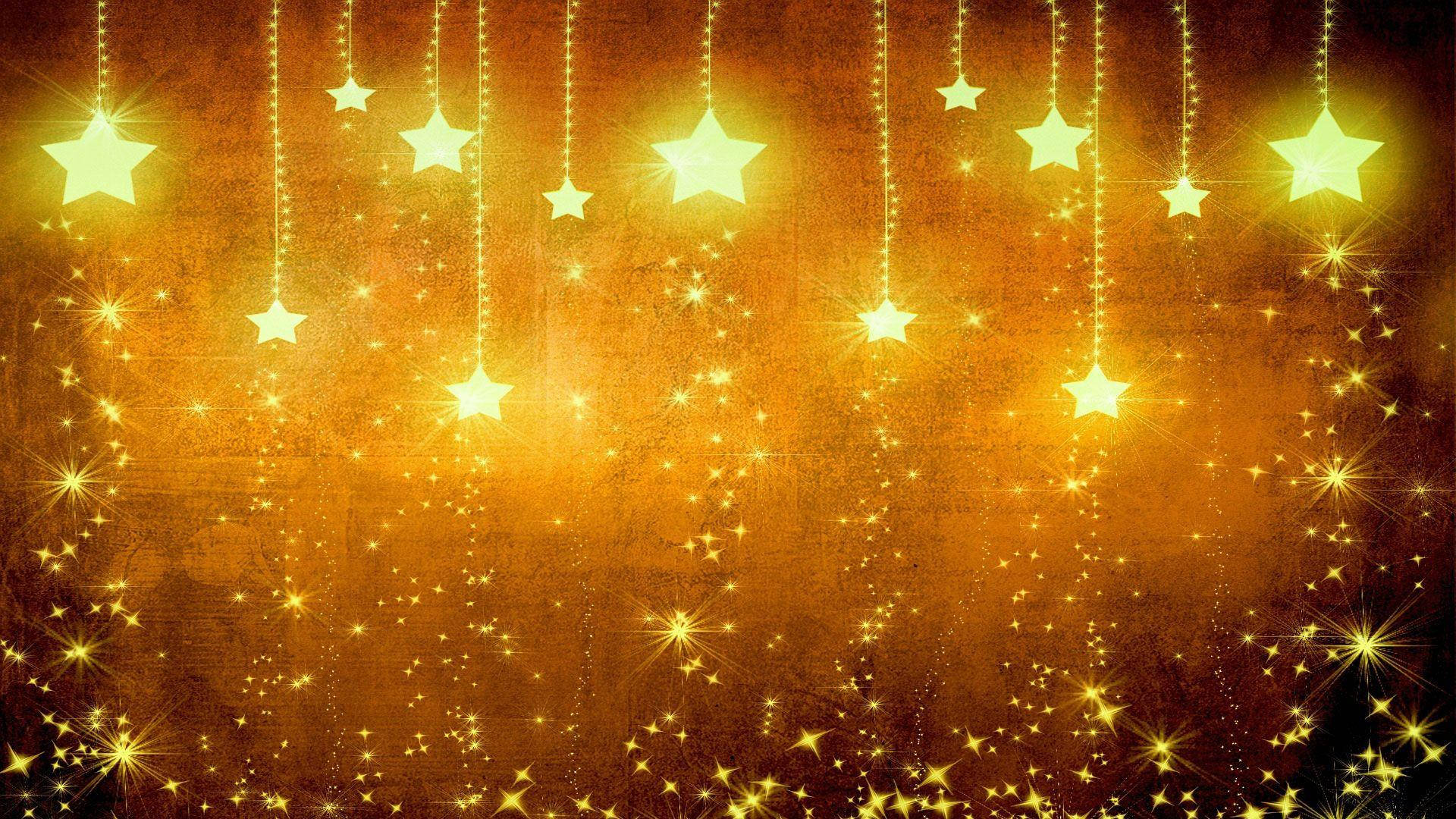 Sparkly Gold Rain Of Stars Wallpaper