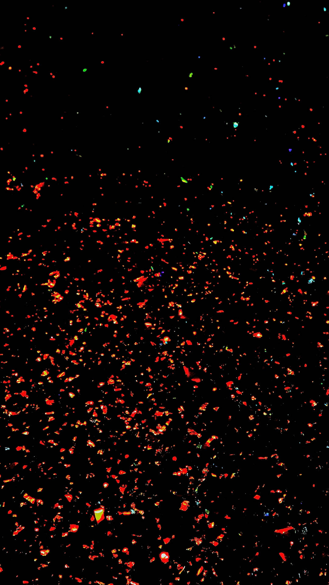 Sparkly Red Pieces In The Dark Sky Wallpaper
