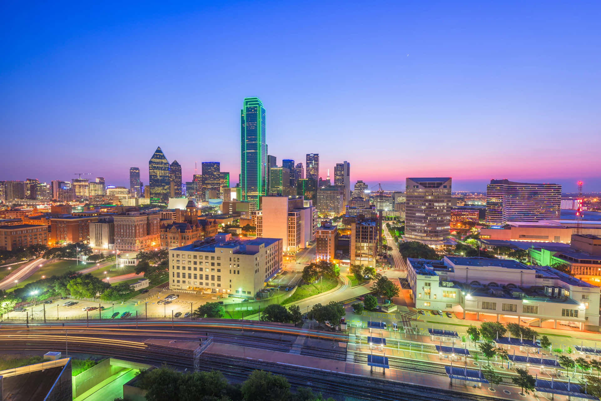Spectacular Skyline View Of Dallas, Texas At Sunset Wallpaper