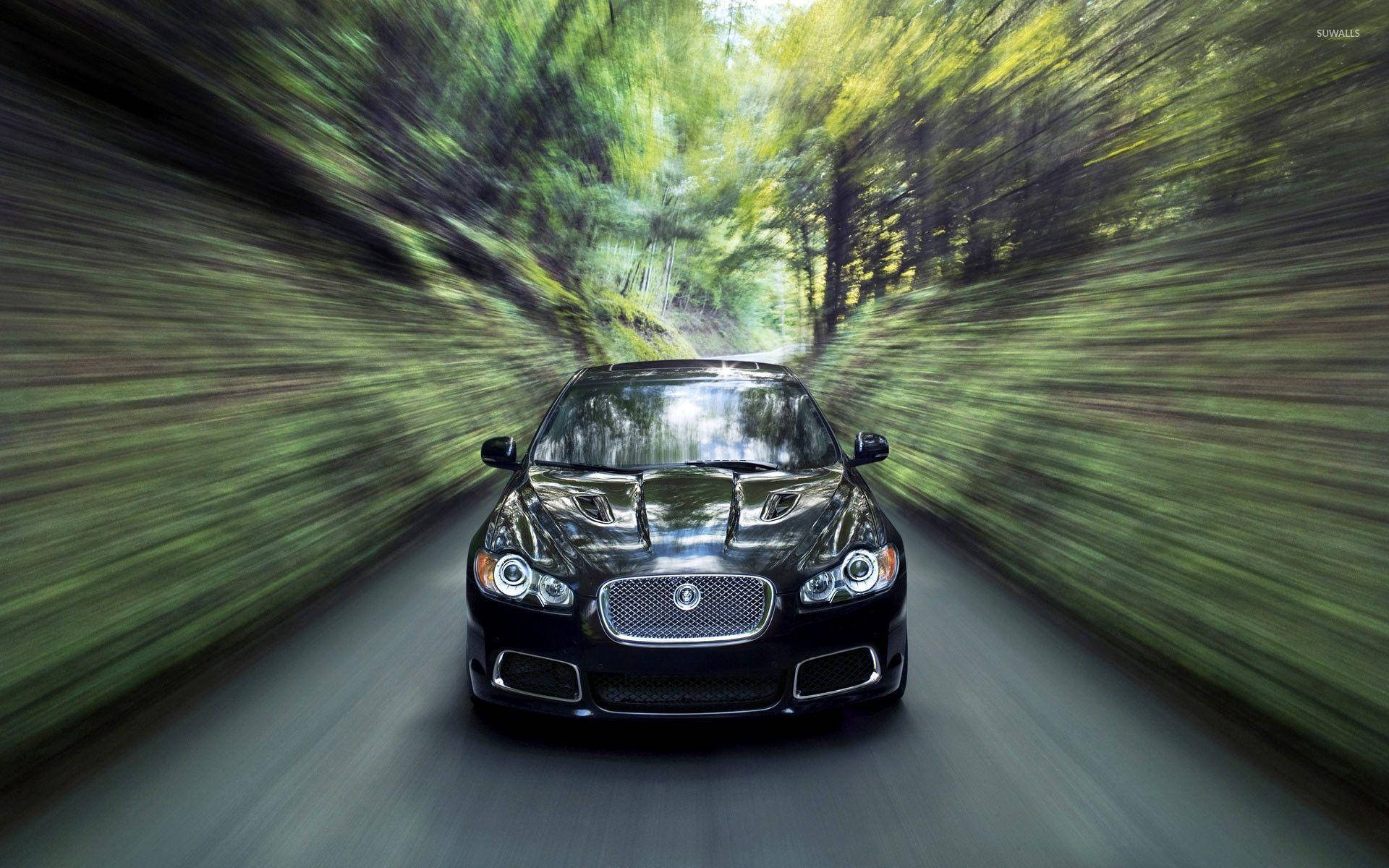 Speedy Black Jaguar Car Wallpaper