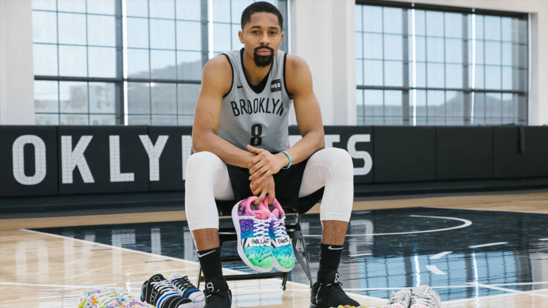Spencer Dinwiddie With Colorful Sneakers Wallpaper