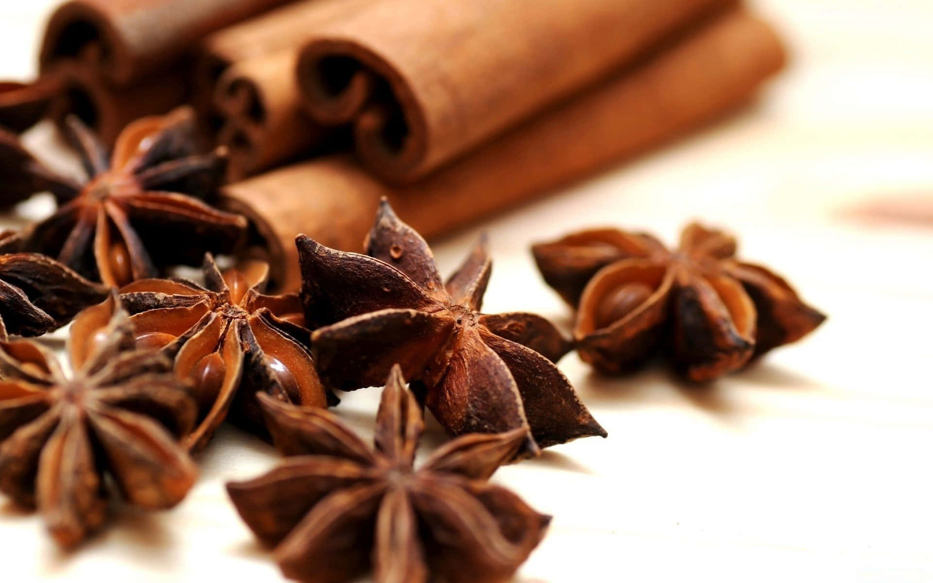 Star Anise And Cinnamon Sticks On A Wooden Table