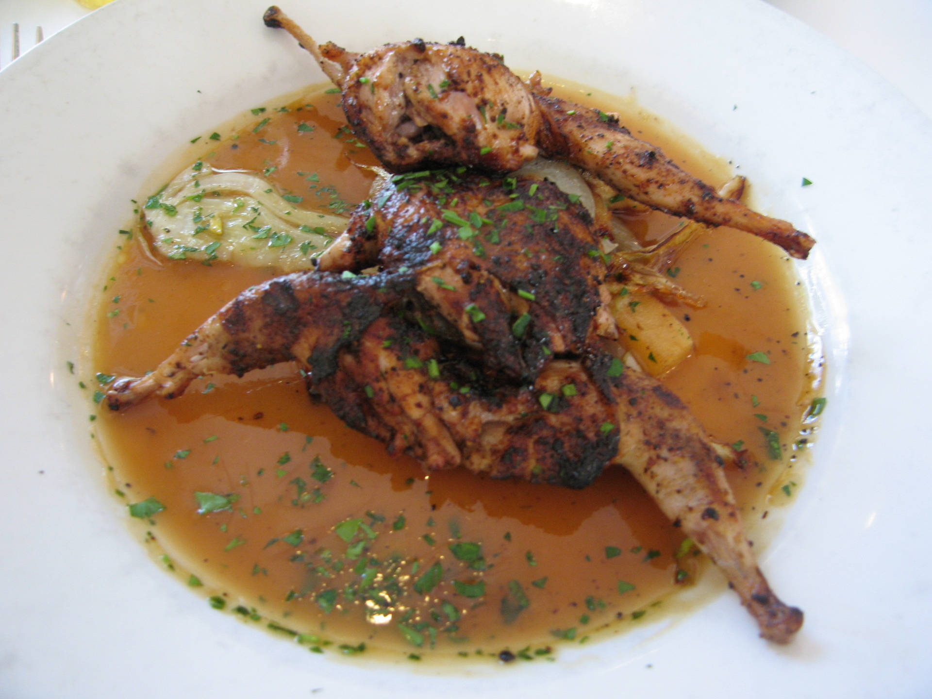 Gourmet Spice-Rubbed Quail with Special Sauce Wallpaper