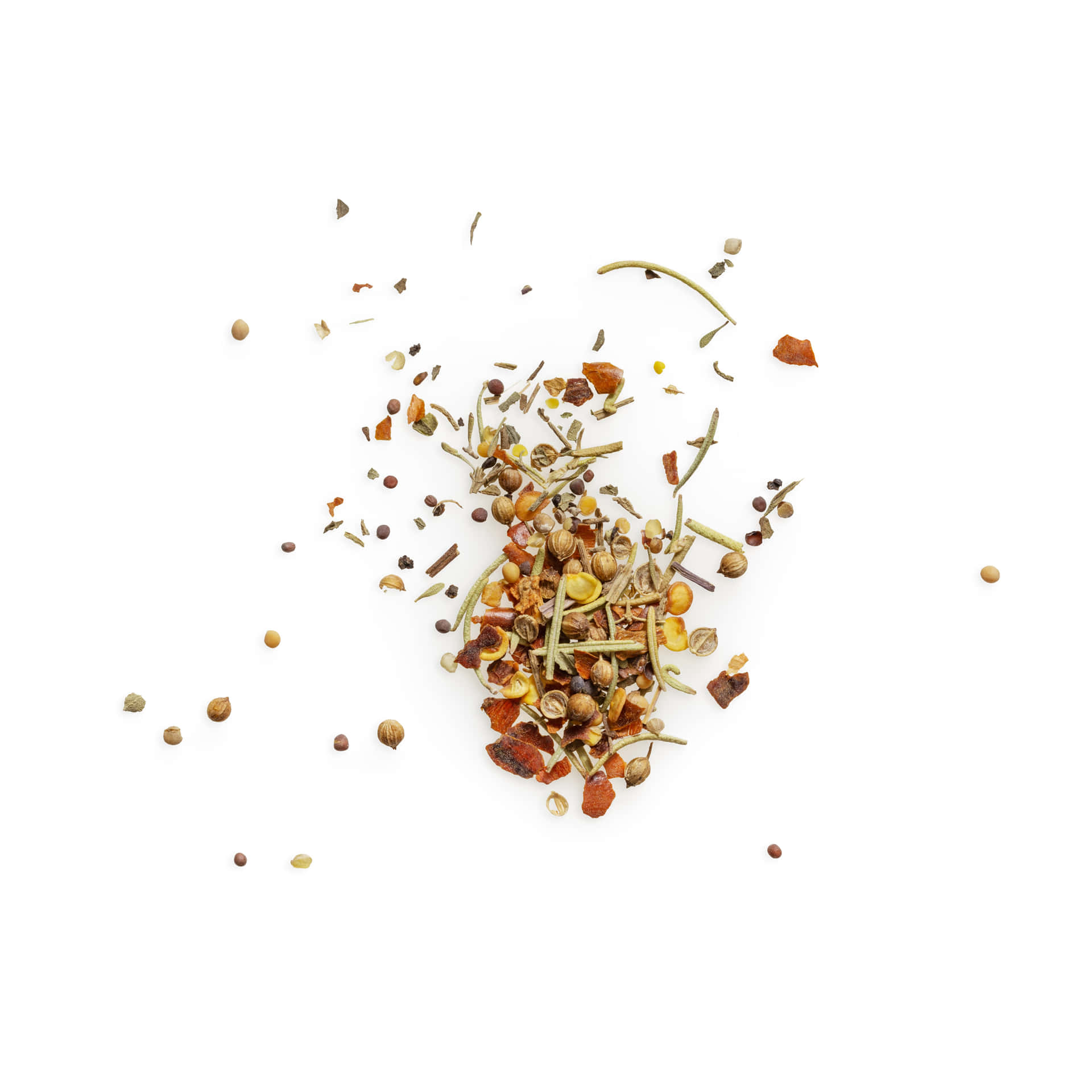 A Pile Of Dried Herbs And Spices On A White Background