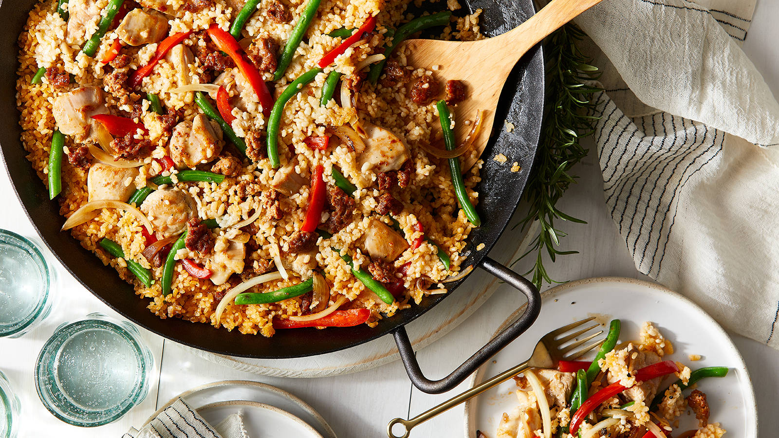 Spicy Paella With Red And Green Chili Peppers Wallpaper