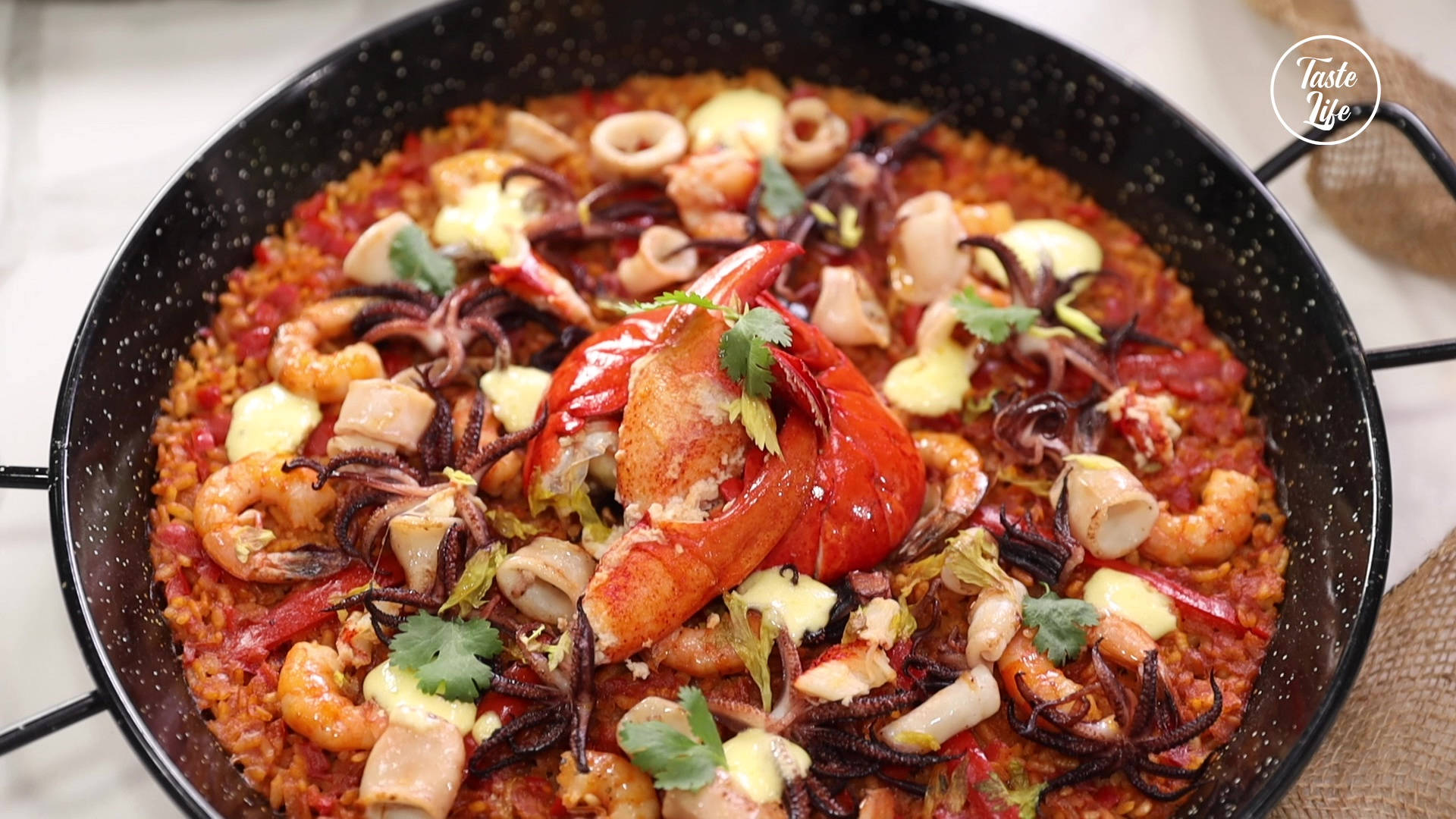 Spicy Seafood Paella With Crab Legs Wallpaper