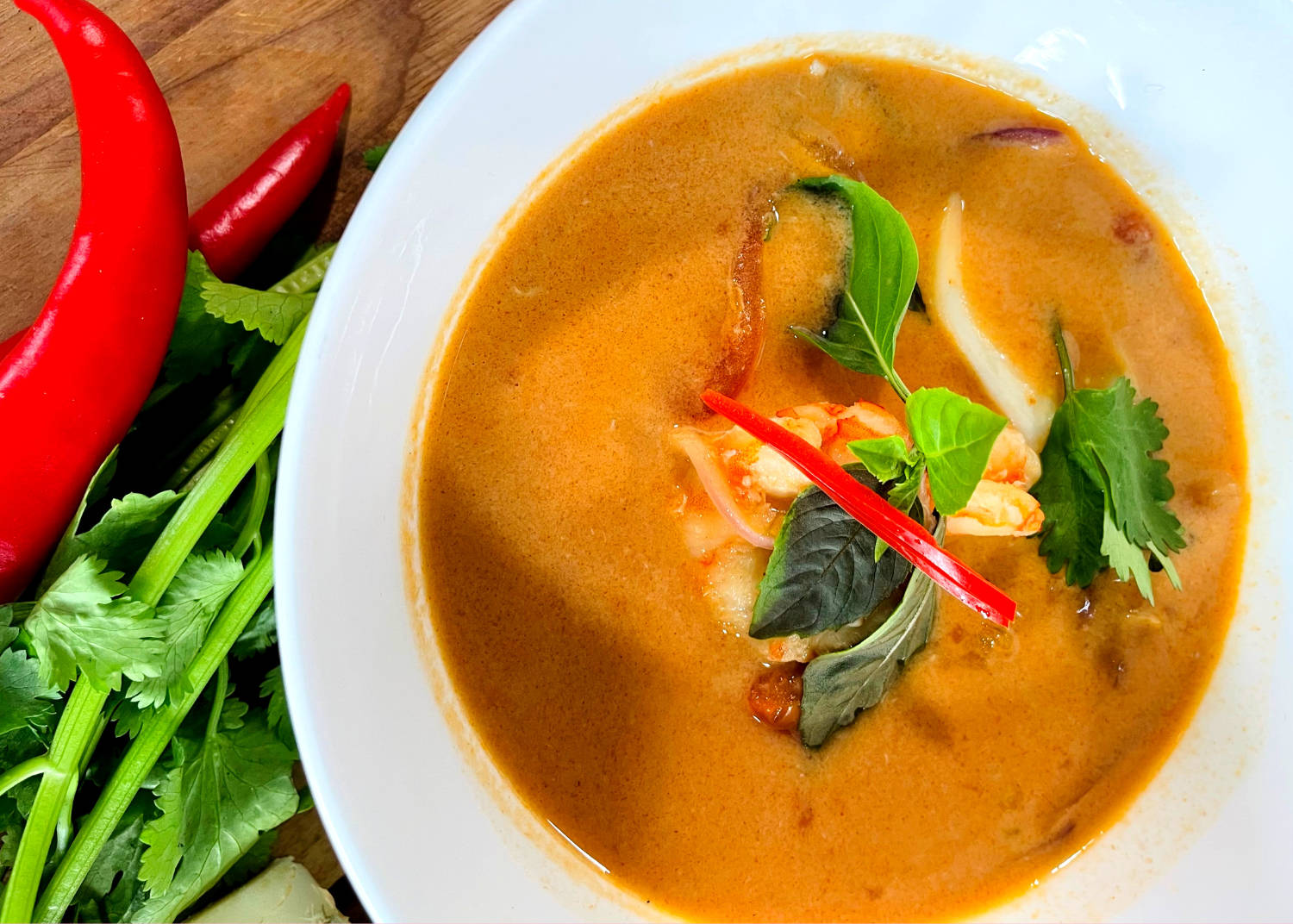 Spicy Tom Yum Soup Infused With Traditional Herbs Wallpaper