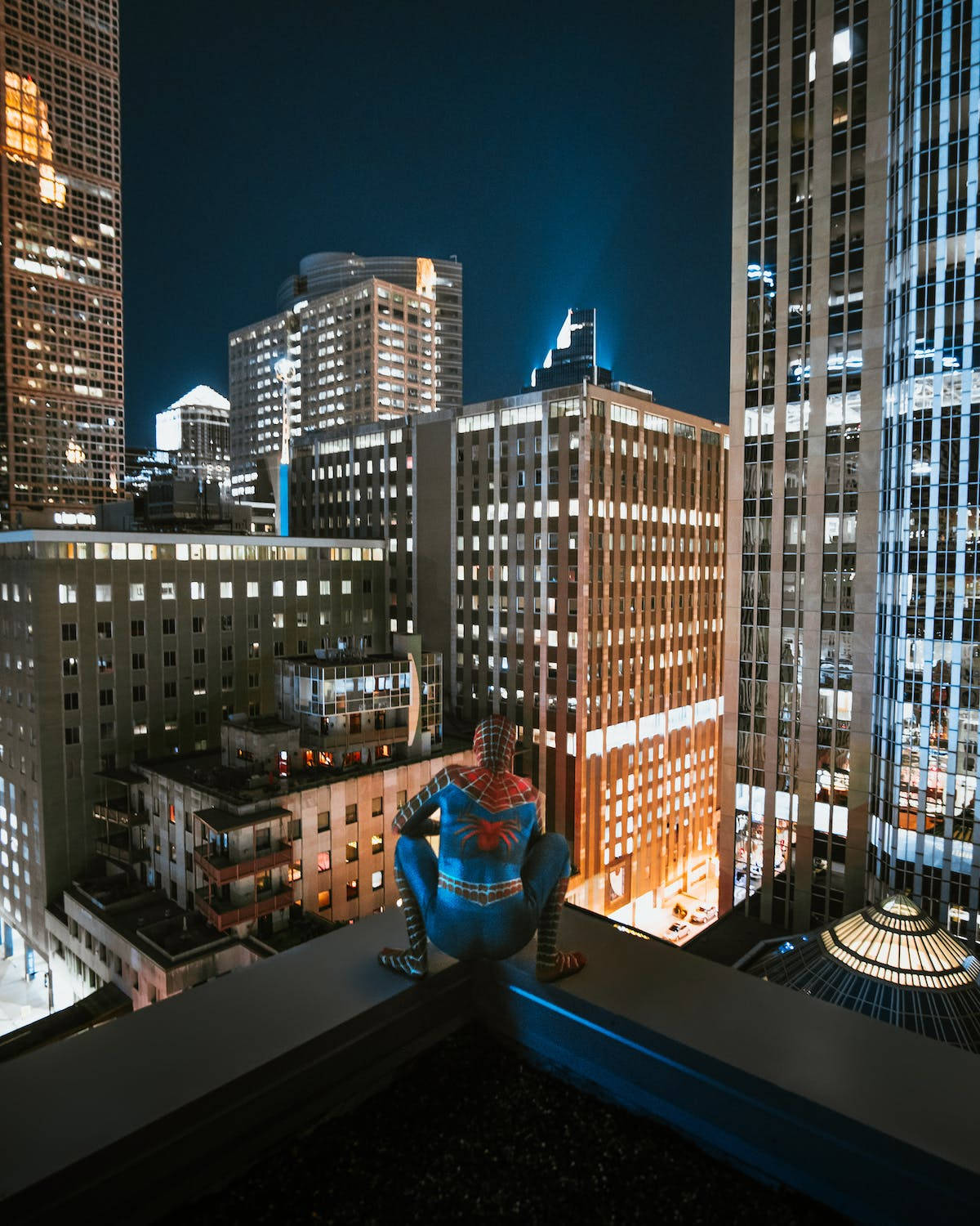 Spider Man Squatting Night City Wallpaper