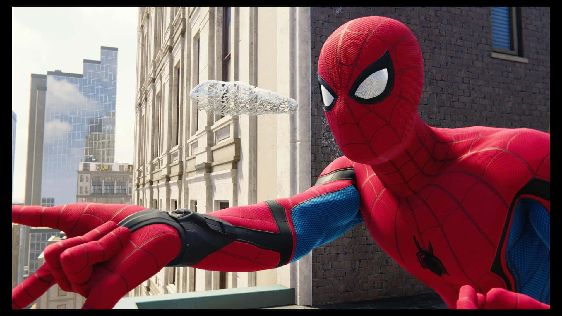 Spider-Man showcasing his web shooter in action Wallpaper