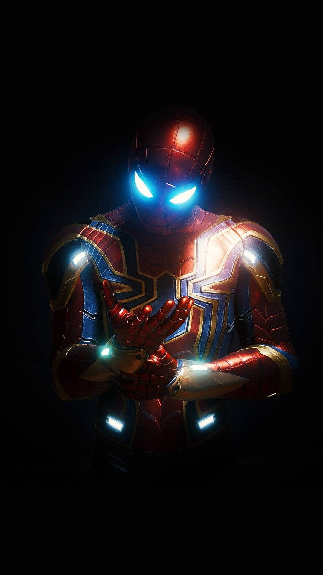 Spiderman in metal suit with glowing blue eyes and different costume marvel studios.