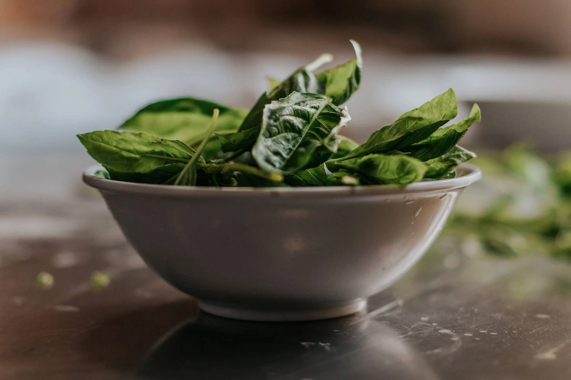 Fresh Spinach in a Ceramic Bowl Wallpaper