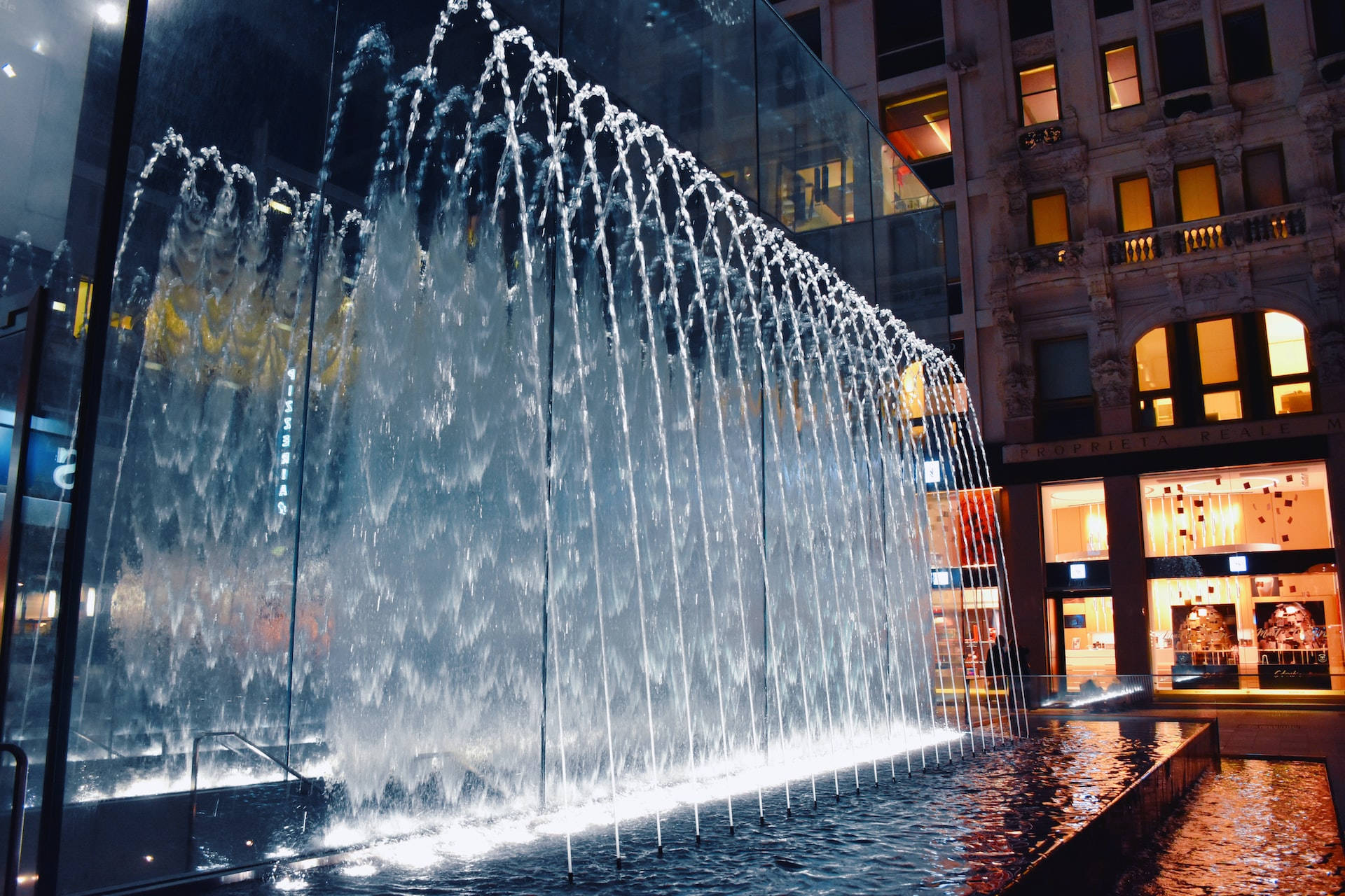 Spiraling Water Fountains in Motion Wallpaper