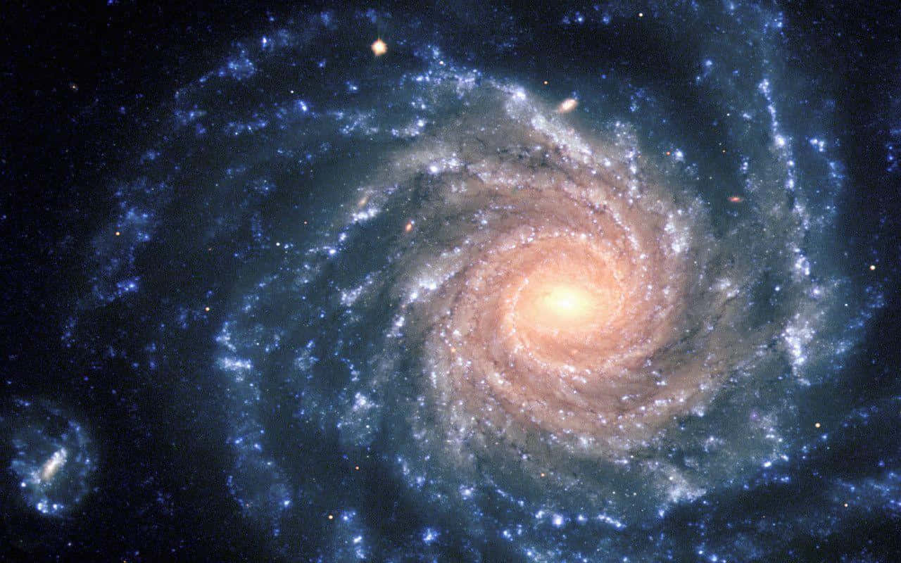 Caption: Stunning Spiral Galaxy Wallpaper Wallpaper